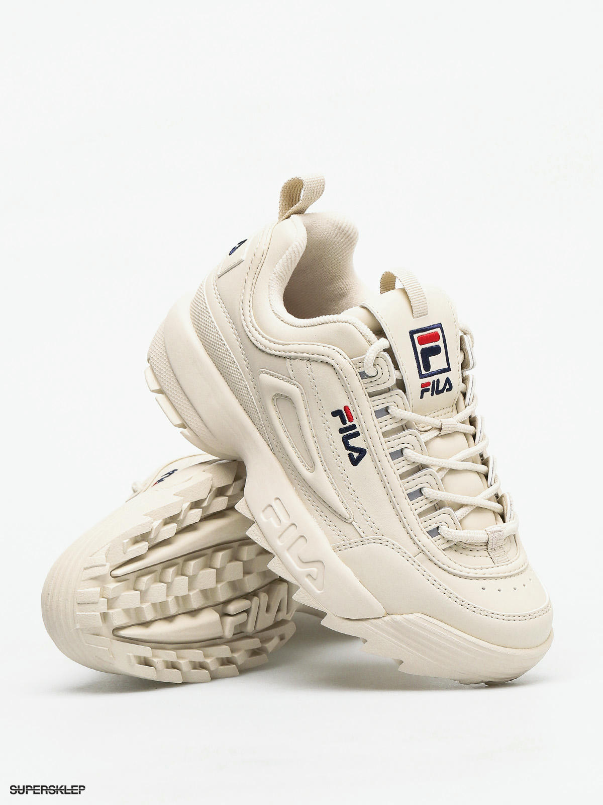 white disruptor sneakers