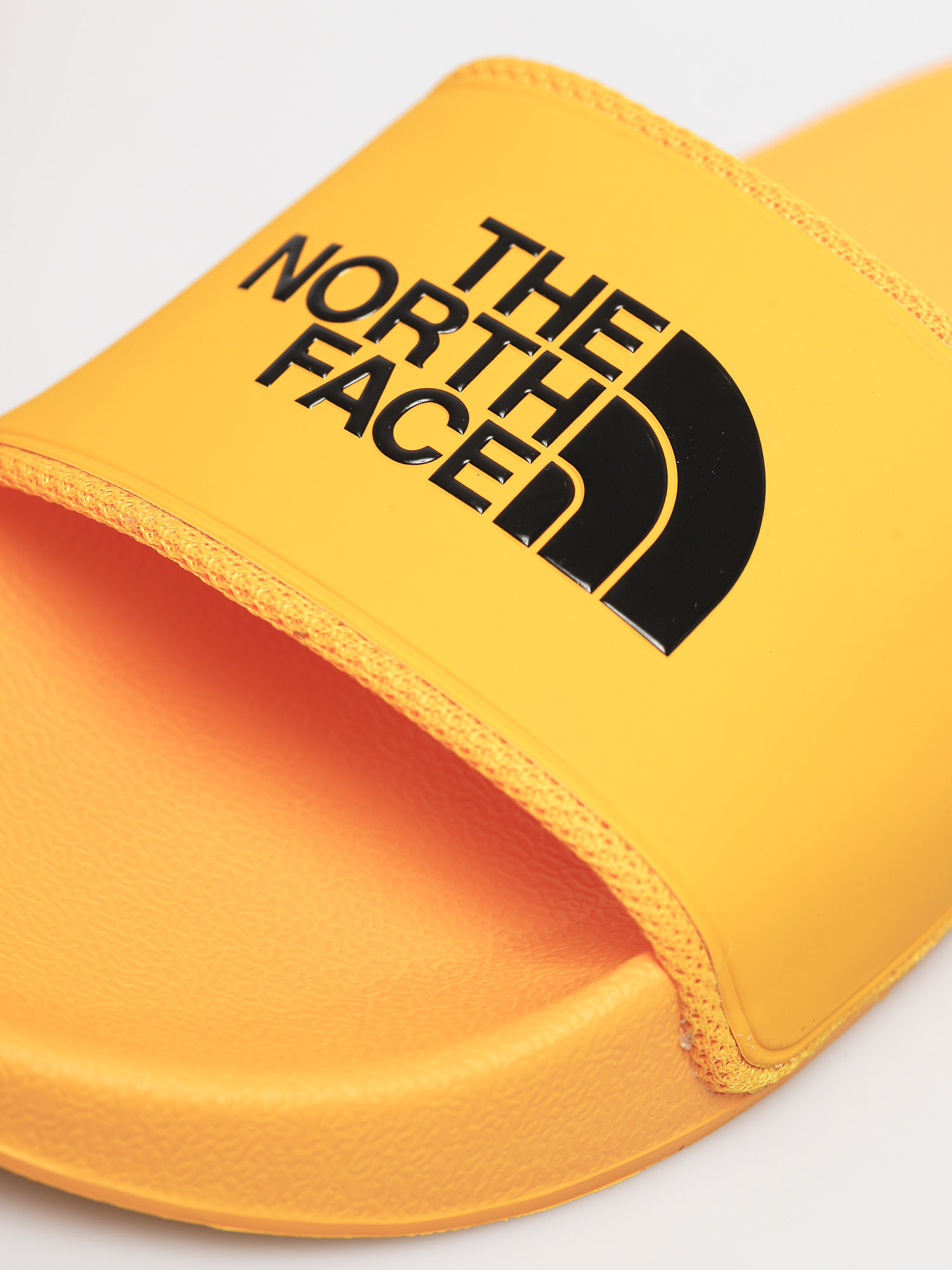 Plážovky The North Face Base Camp II (summit gold/black)