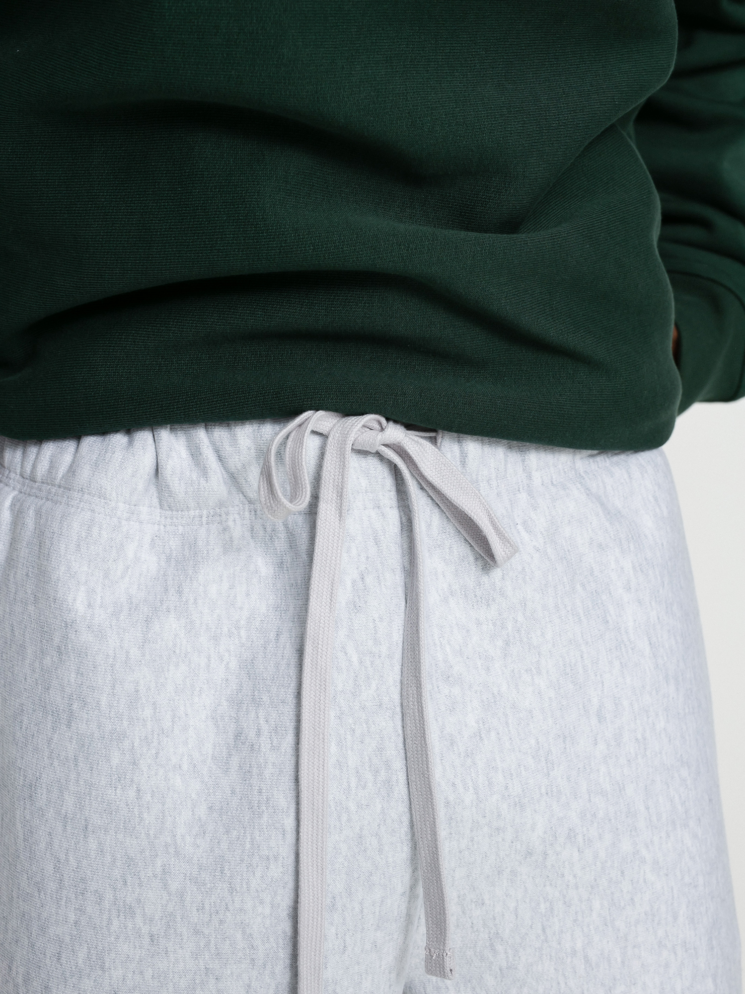 Kalhoty Carhartt WIP American Script Jogging (ash heather)