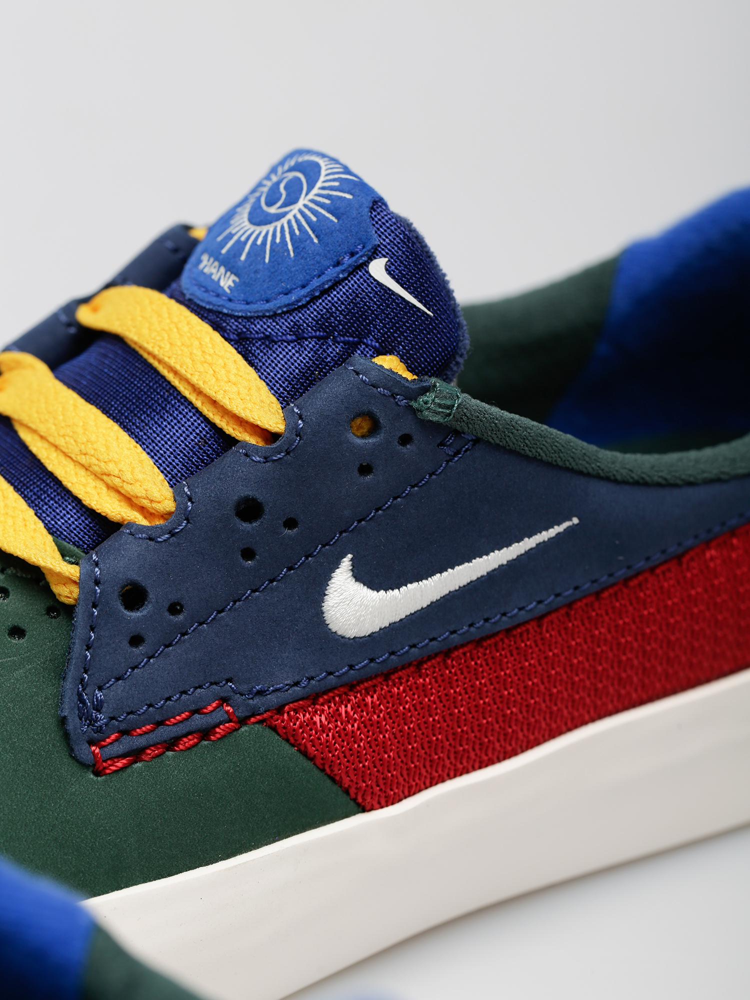 Boty Nike SB Shane (noble green/sail varsity red navy)