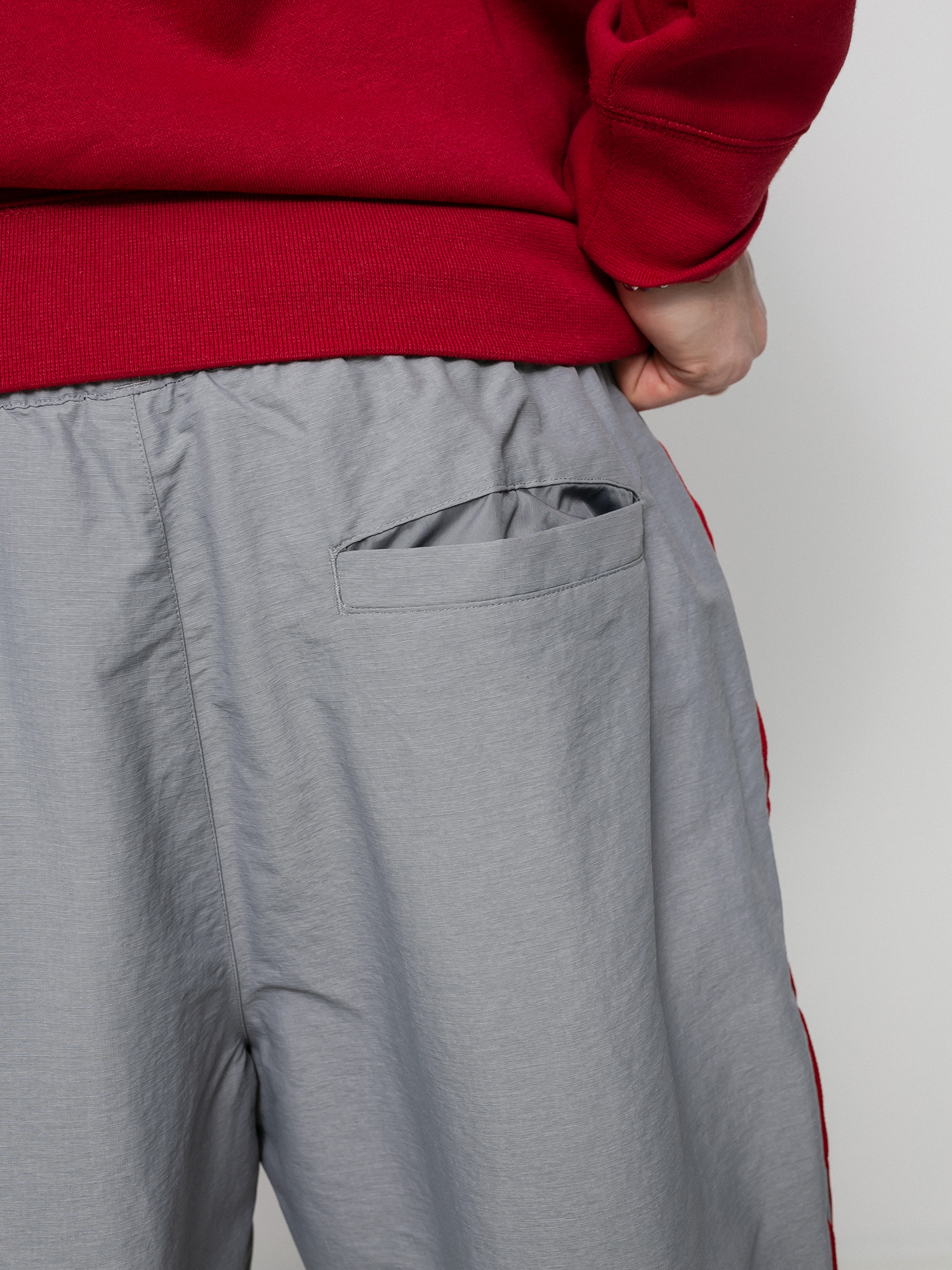 Kalhoty adidas Sst Track (grey/white/tmvire)