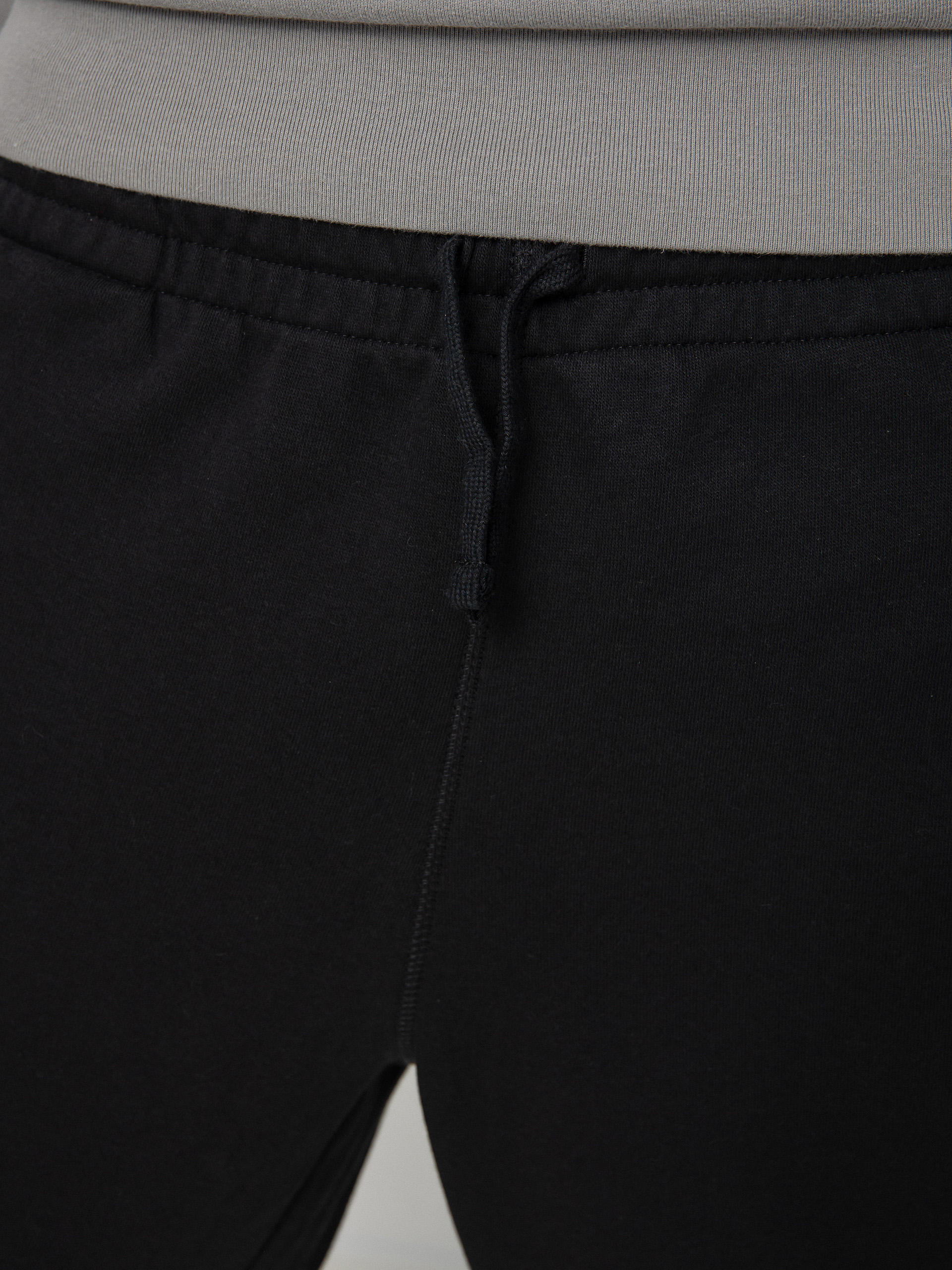 Kalhoty New Balance Essentials Uni Ssentials (black)