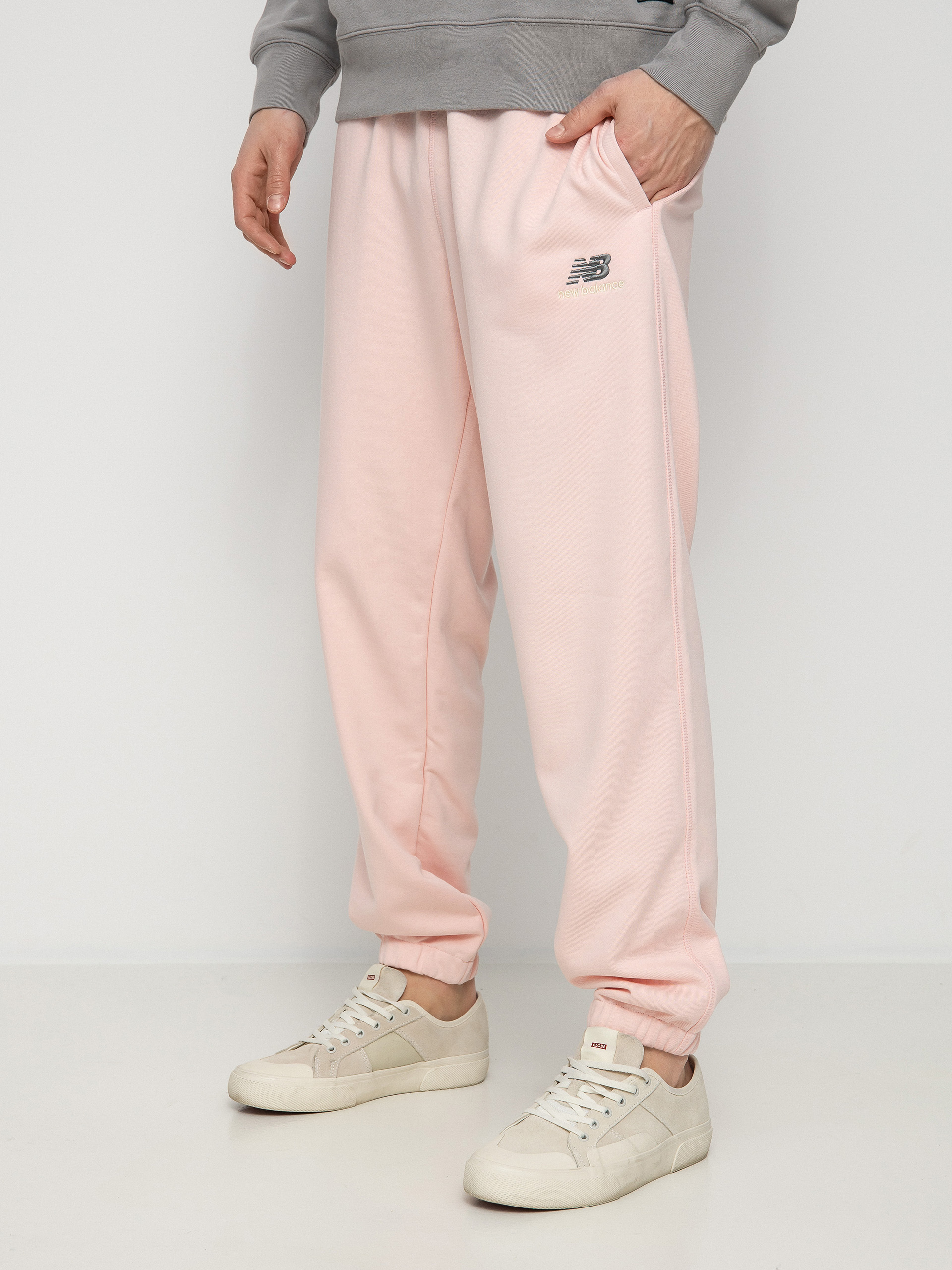 Kalhoty New Balance Essentials Uni Ssentials (pink)