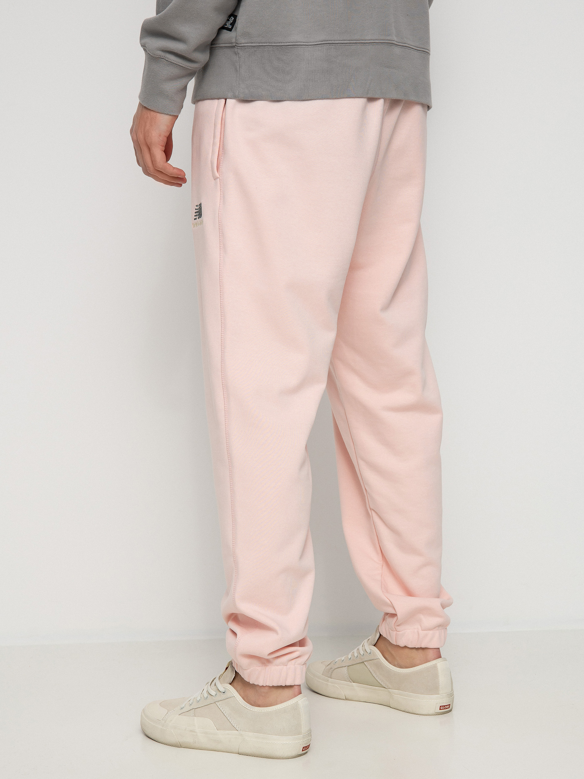 Kalhoty New Balance Essentials Uni Ssentials (pink)