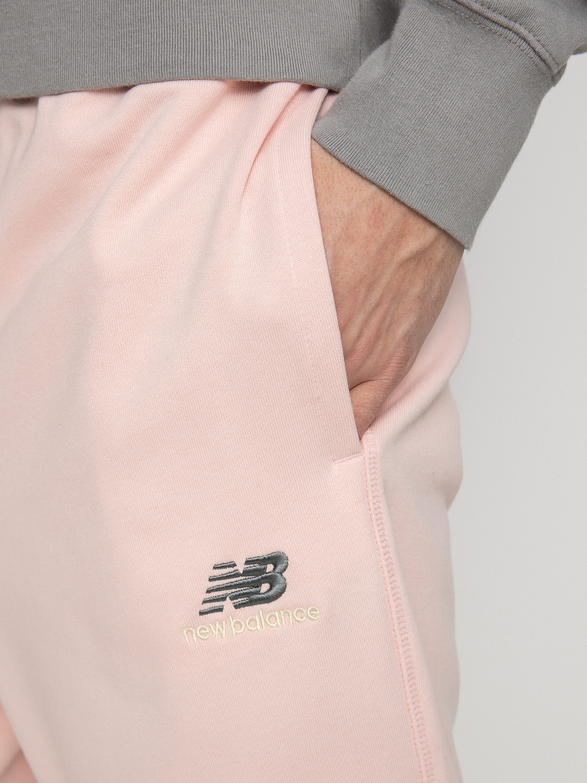 Kalhoty New Balance Essentials Uni Ssentials (pink)
