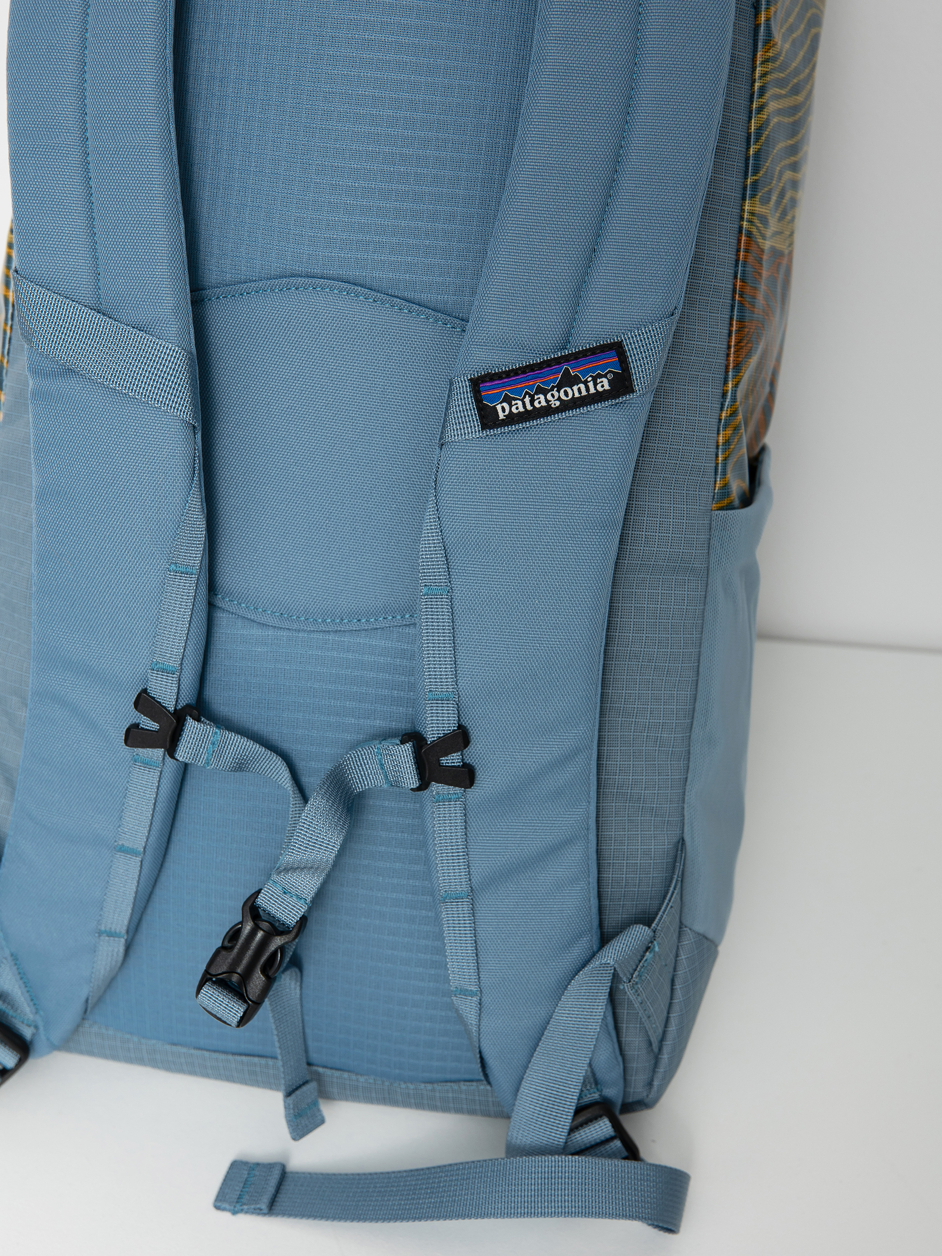 Batoh Patagonia Black Hole Pack 25L (rock cycle multi big light plume grey)