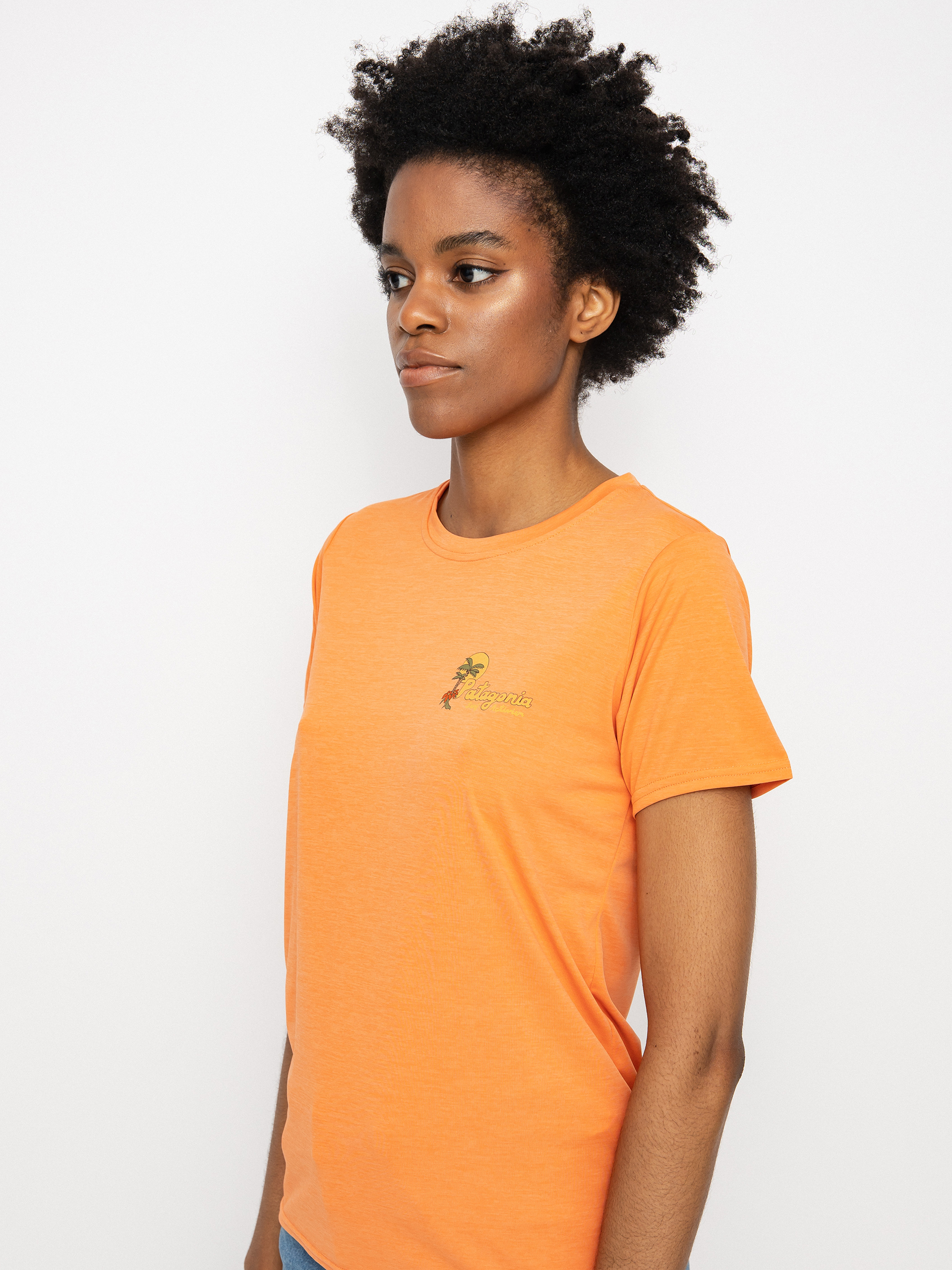 Tričko Patagonia Cap Cool Daily Graphic Wmn (palm protest tigerlily orange x-dye)