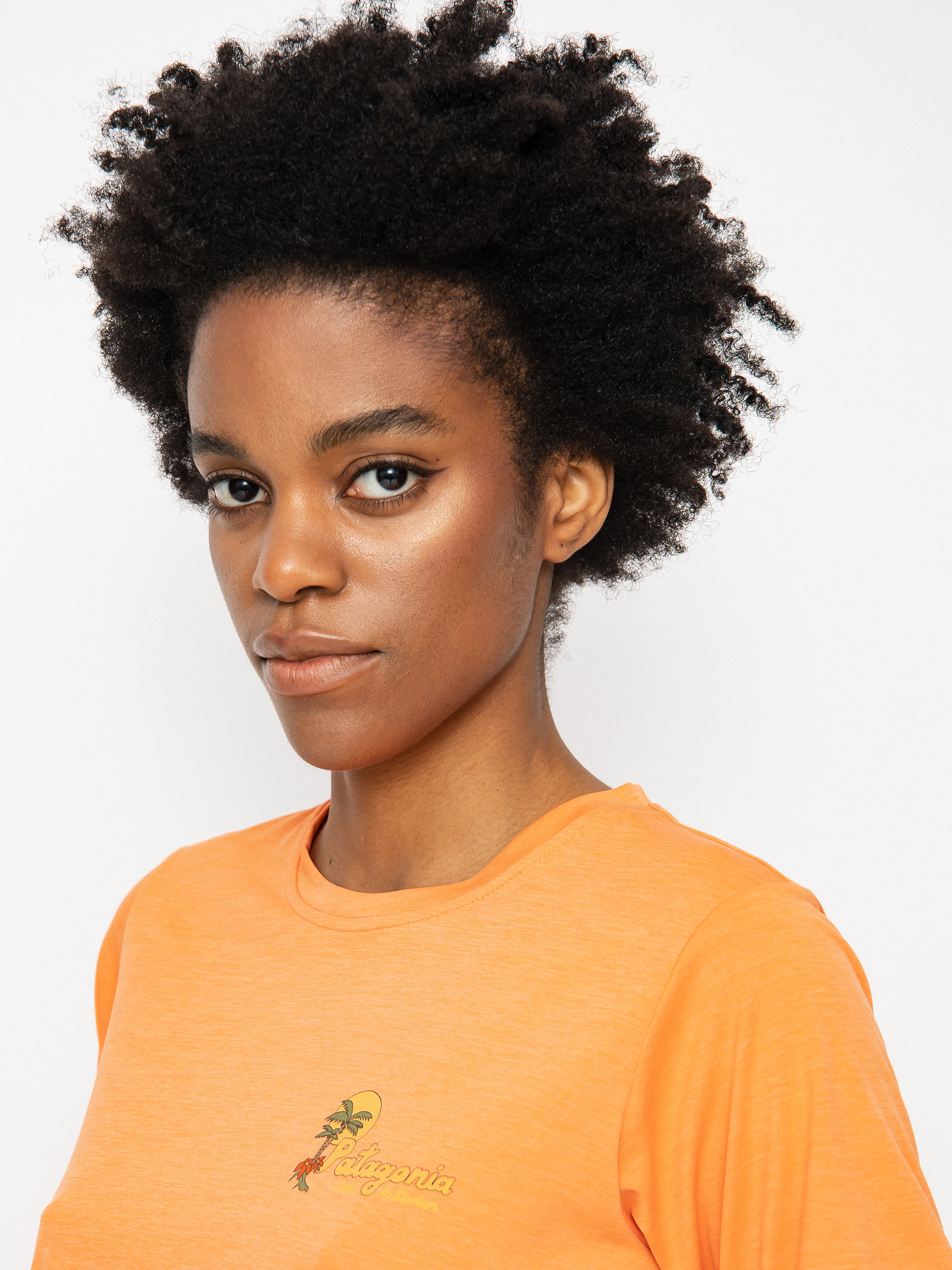 Tričko Patagonia Cap Cool Daily Graphic Wmn (palm protest tigerlily orange x-dye)