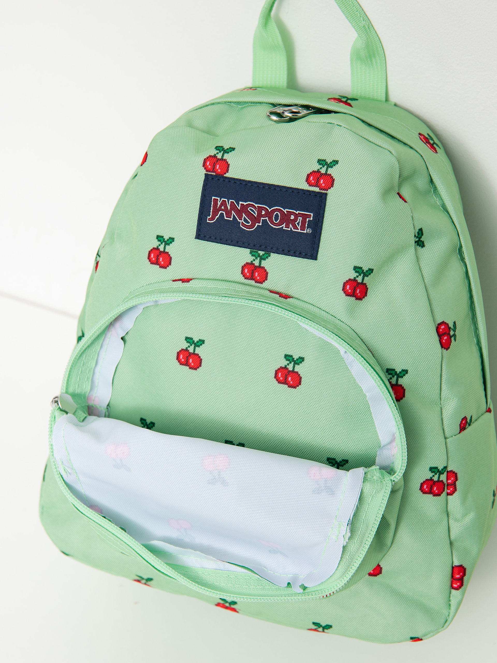 Batoh JanSport Half Pint (8 bit cherries)