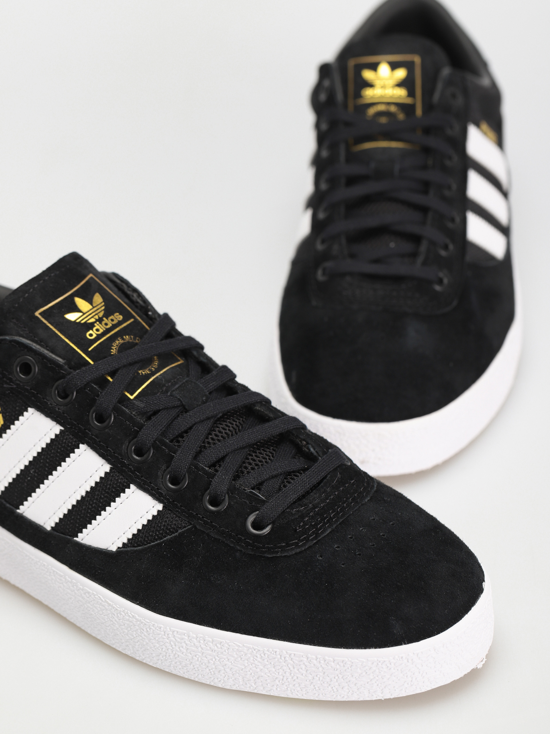 Boty adidas Puig Indoor (cblack/ftwwht/pullim)