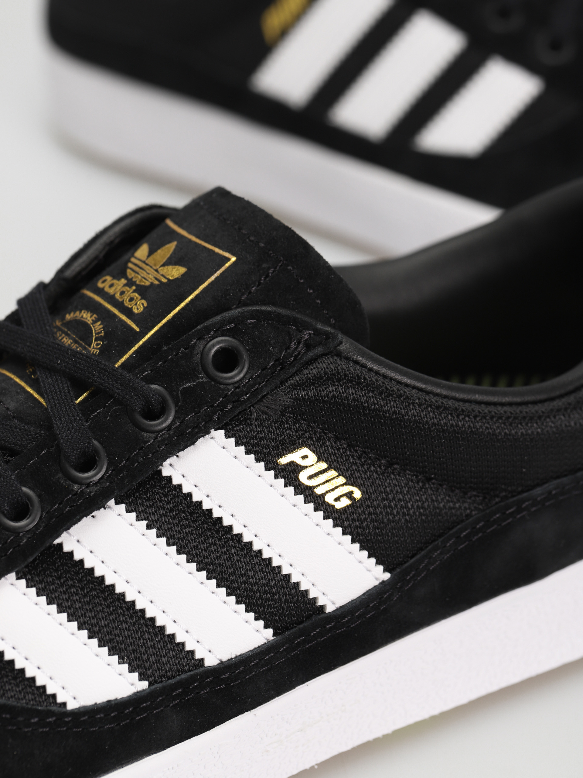 Boty adidas Puig Indoor (cblack/ftwwht/pullim)