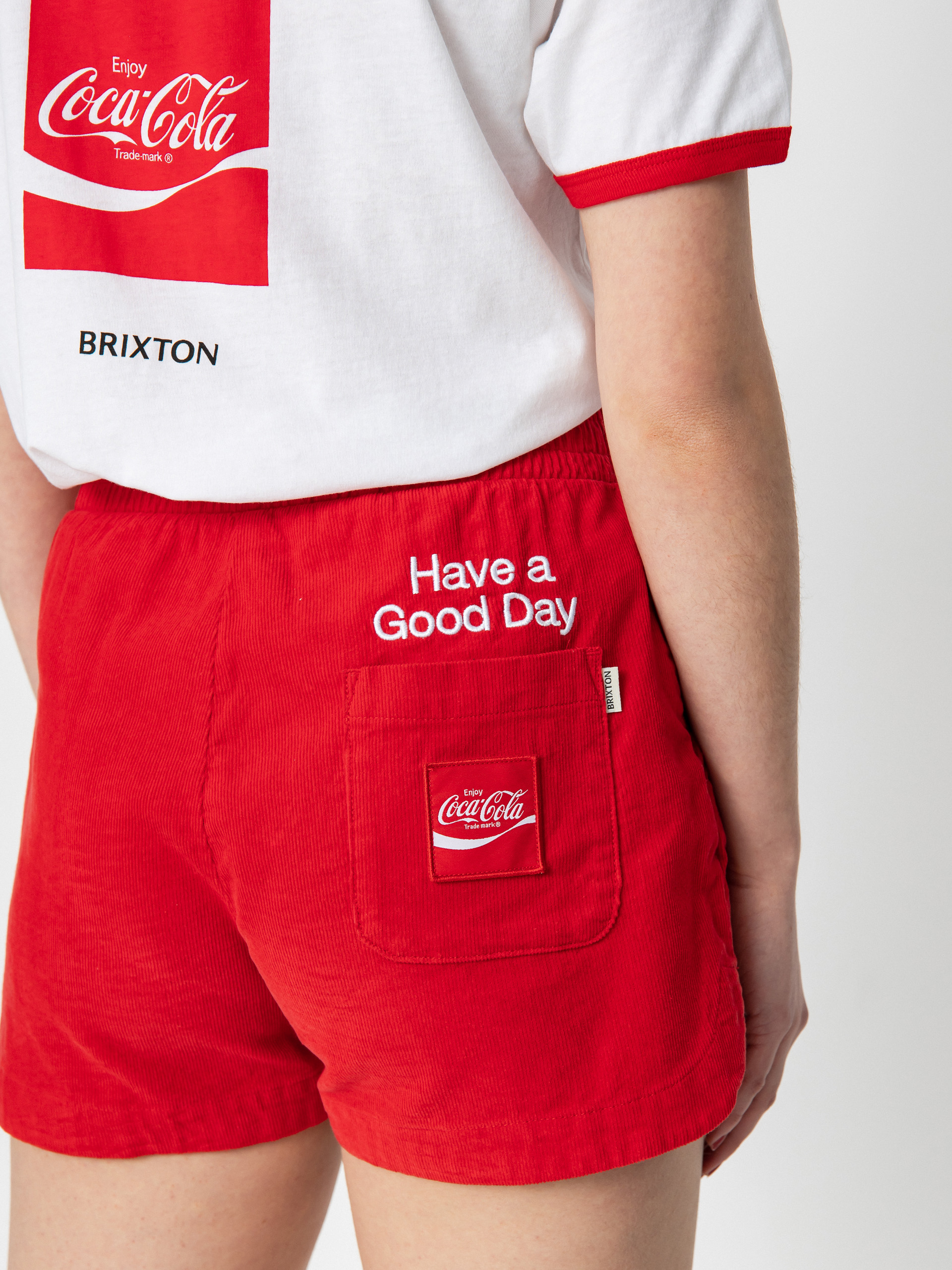 Kraťasy Brixton Coca-Cola Runner Wmn (cokered)