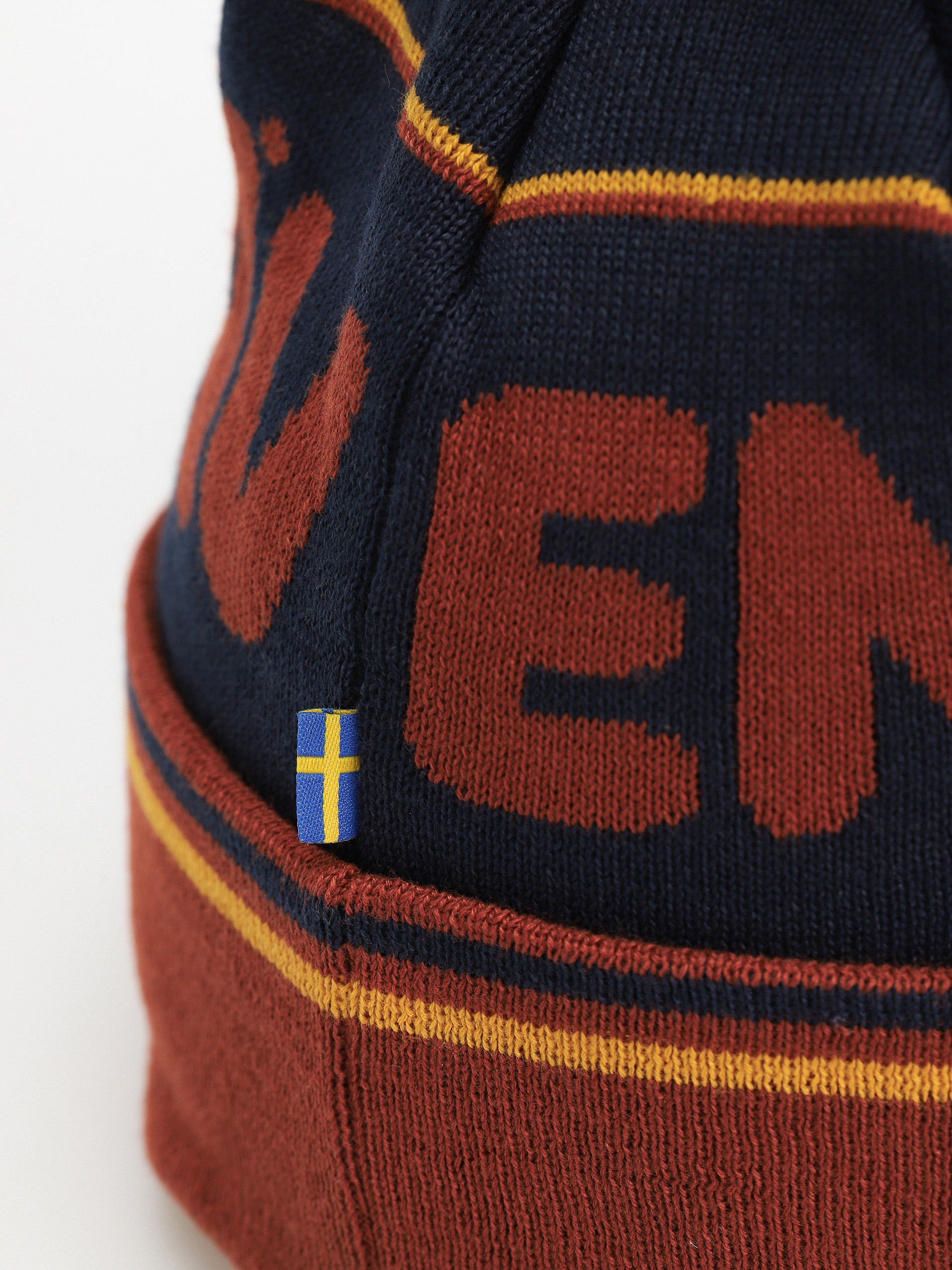 Čepice Fjallraven Pom (autumn leaf/dark navy)