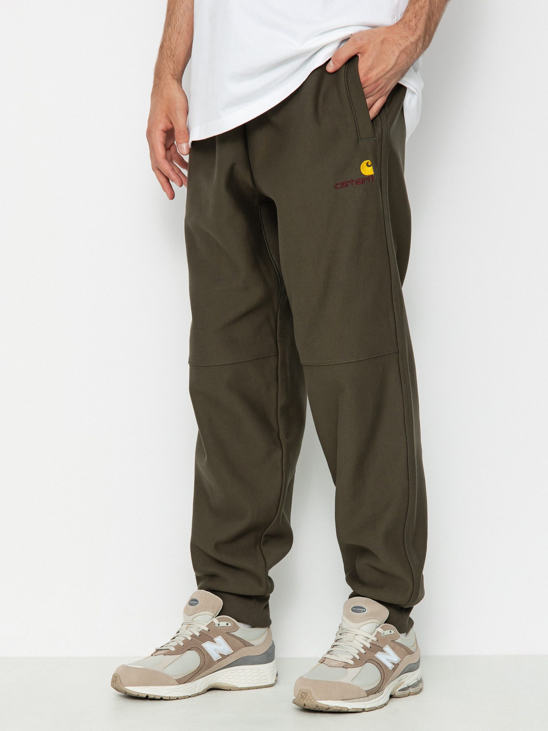 Kalhoty Carhartt WIP American Script Jogging (plant)