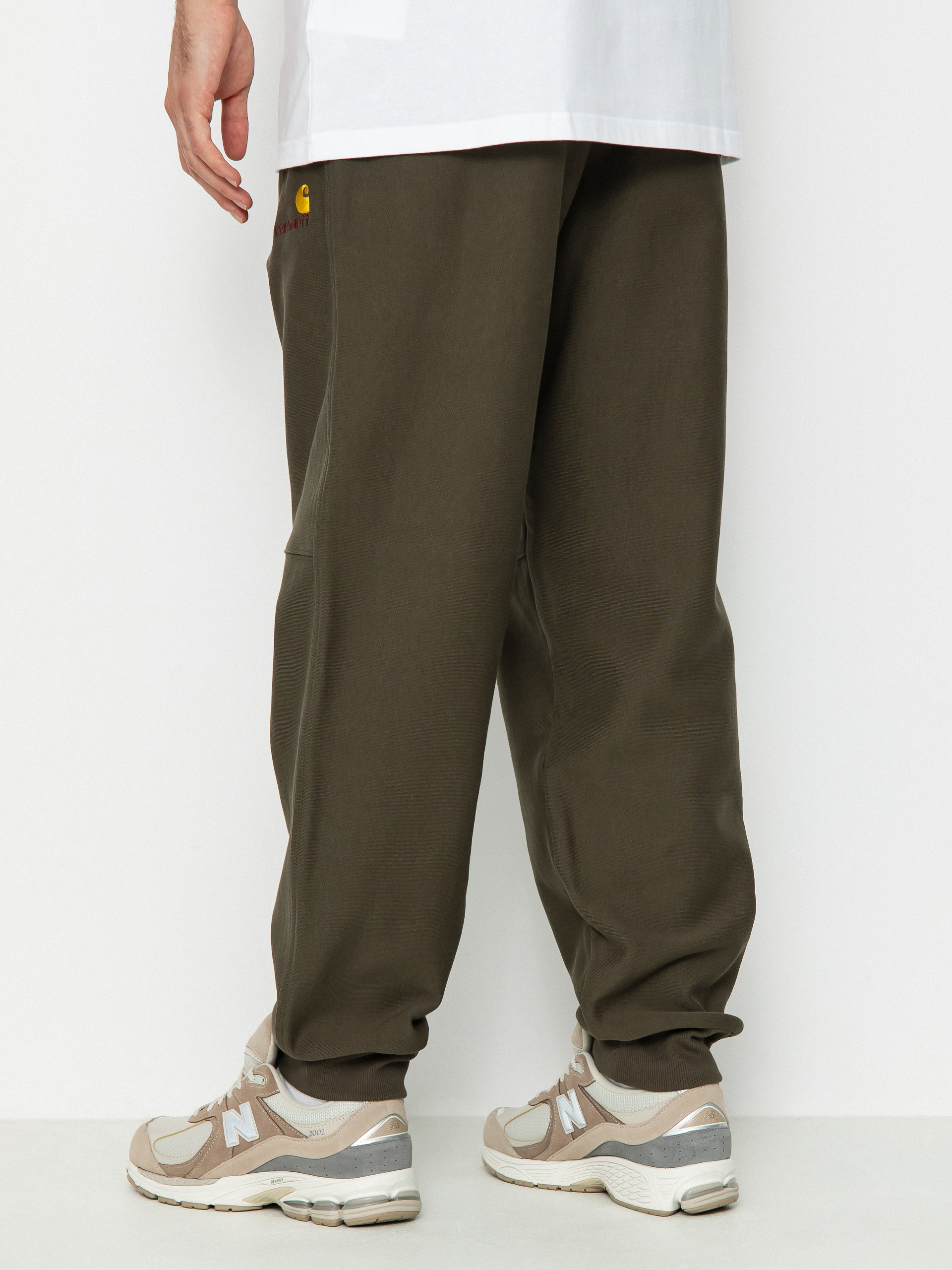 Kalhoty Carhartt WIP American Script Jogging (plant)