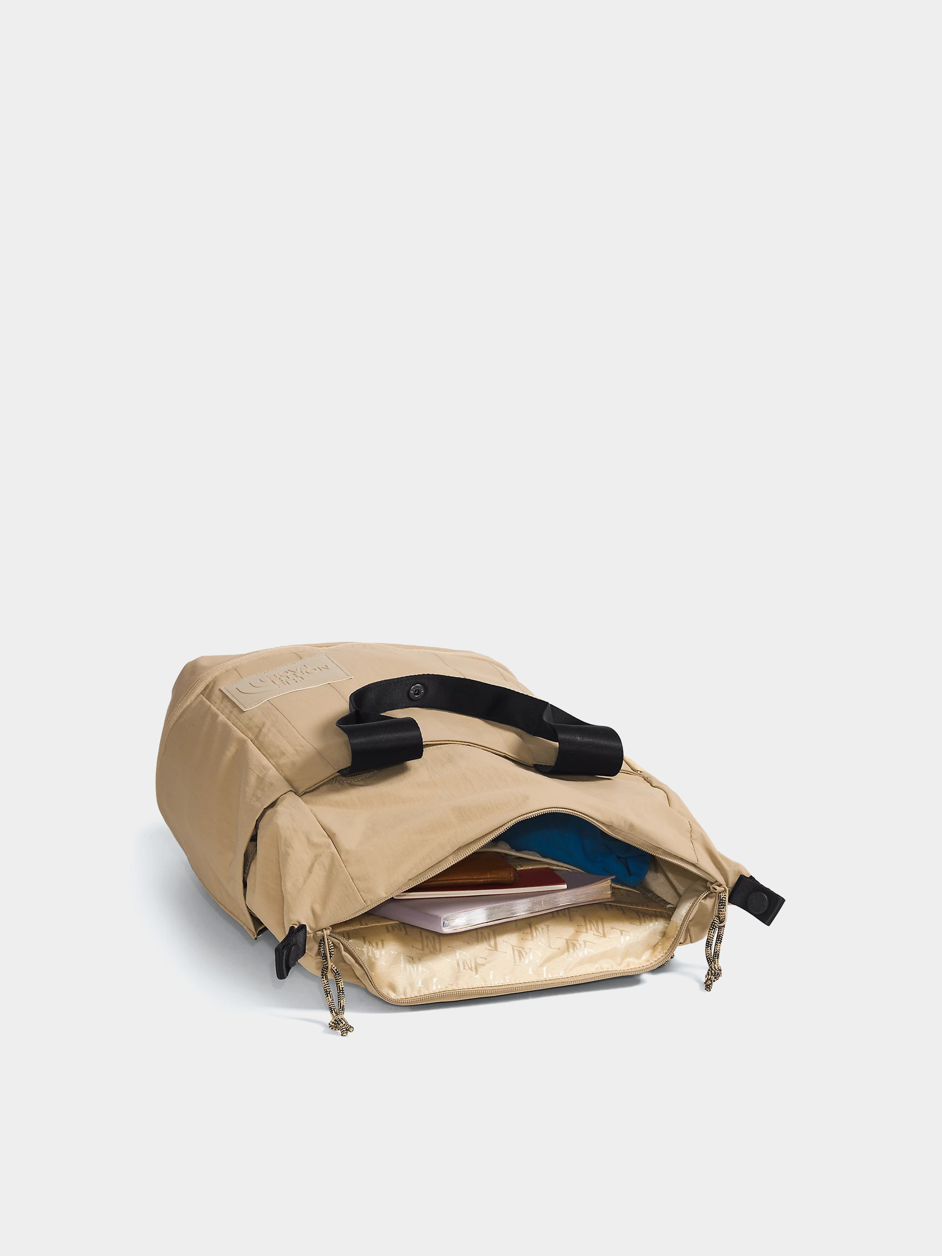 Batoh The North Face Never Stop Utility Pack Wmn (kelp tan/tnf black)