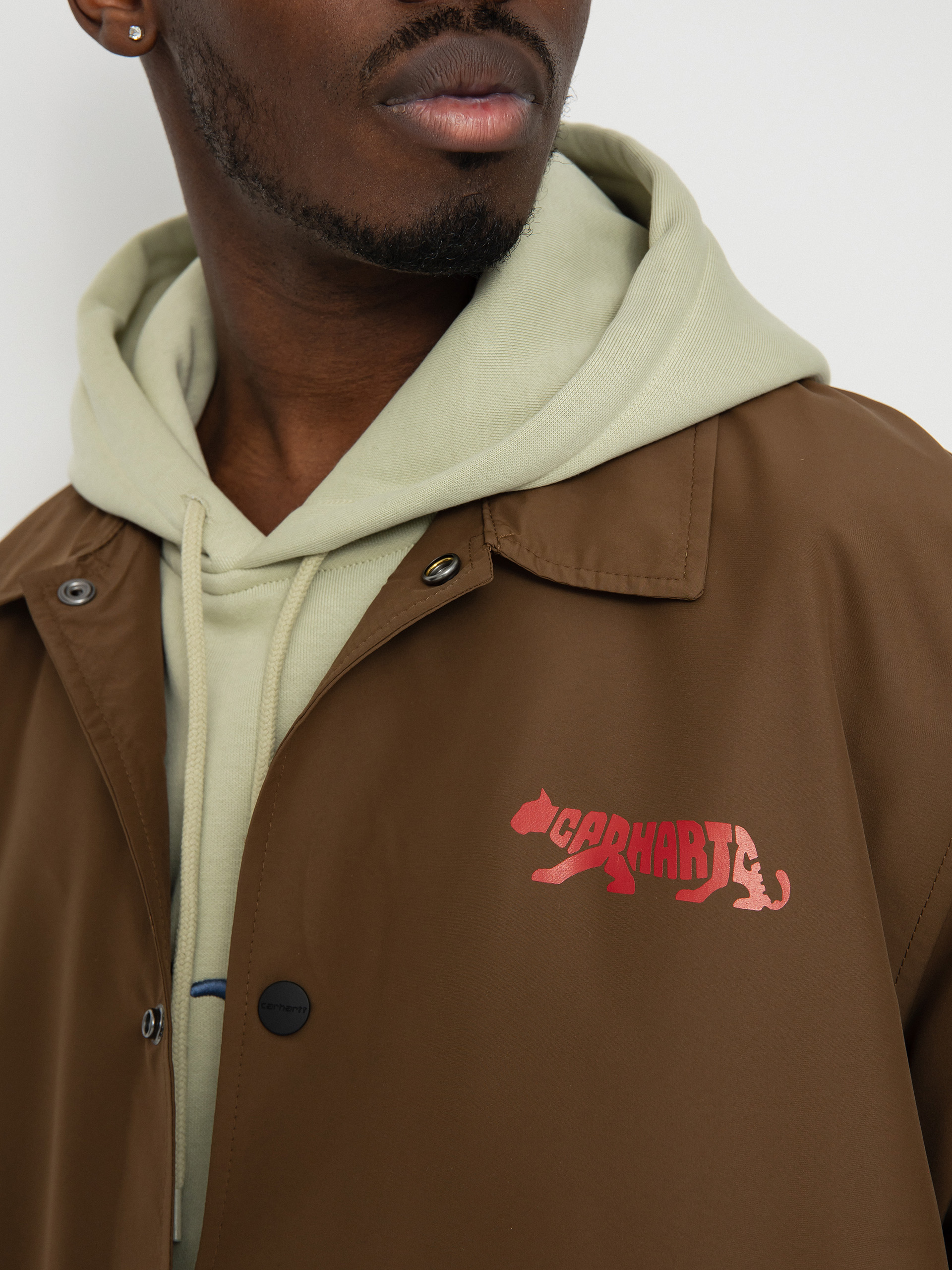 Bunda Carhartt WIP Rocky Coach (lumber/samba/black)