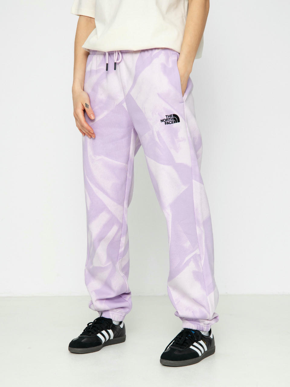 Kalhoty The North Face Essential Jogger Print Wmn (icy lilac garment fold)