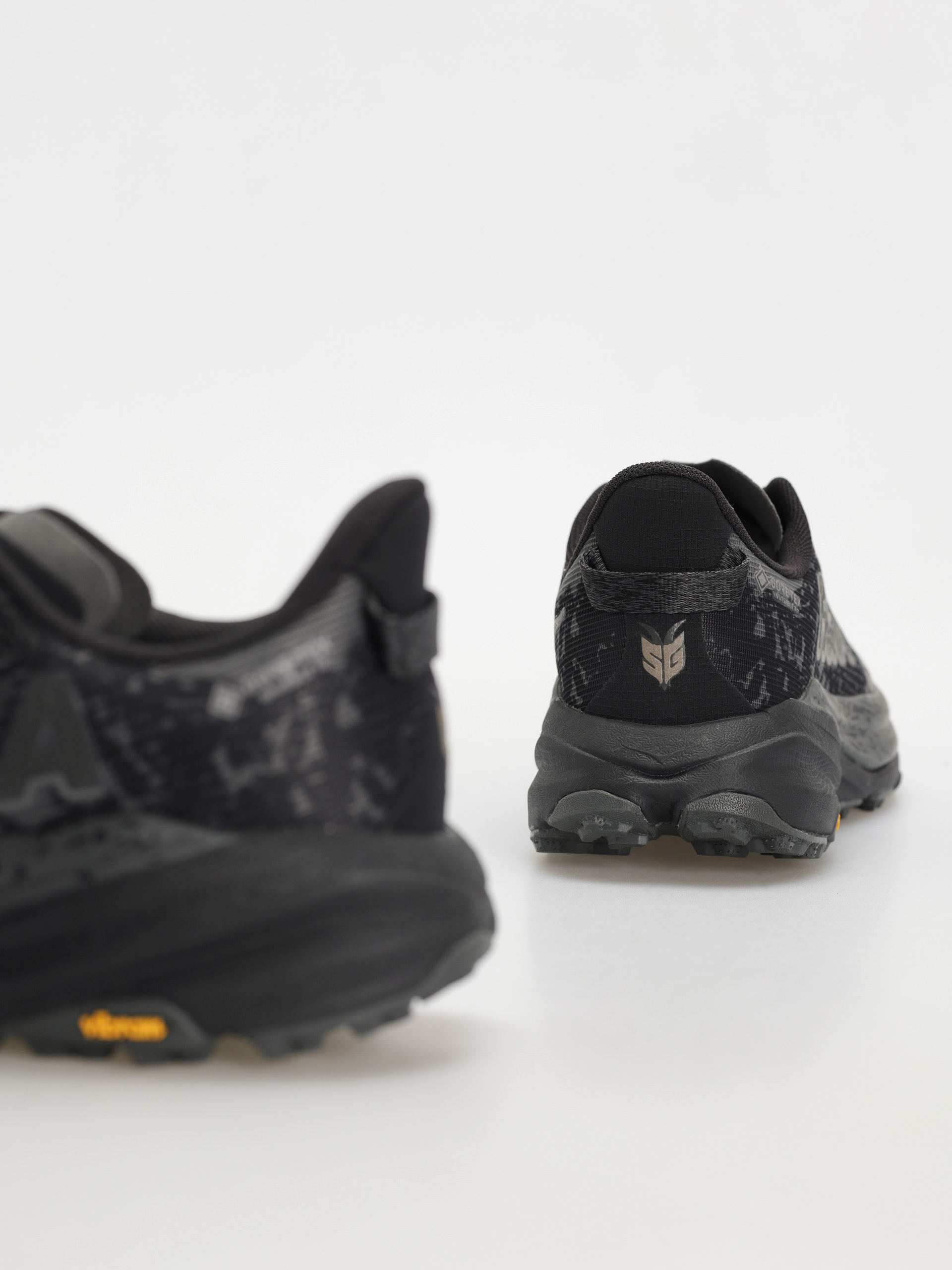 Boty Hoka Speedgoat 6 (black/outer orbit)