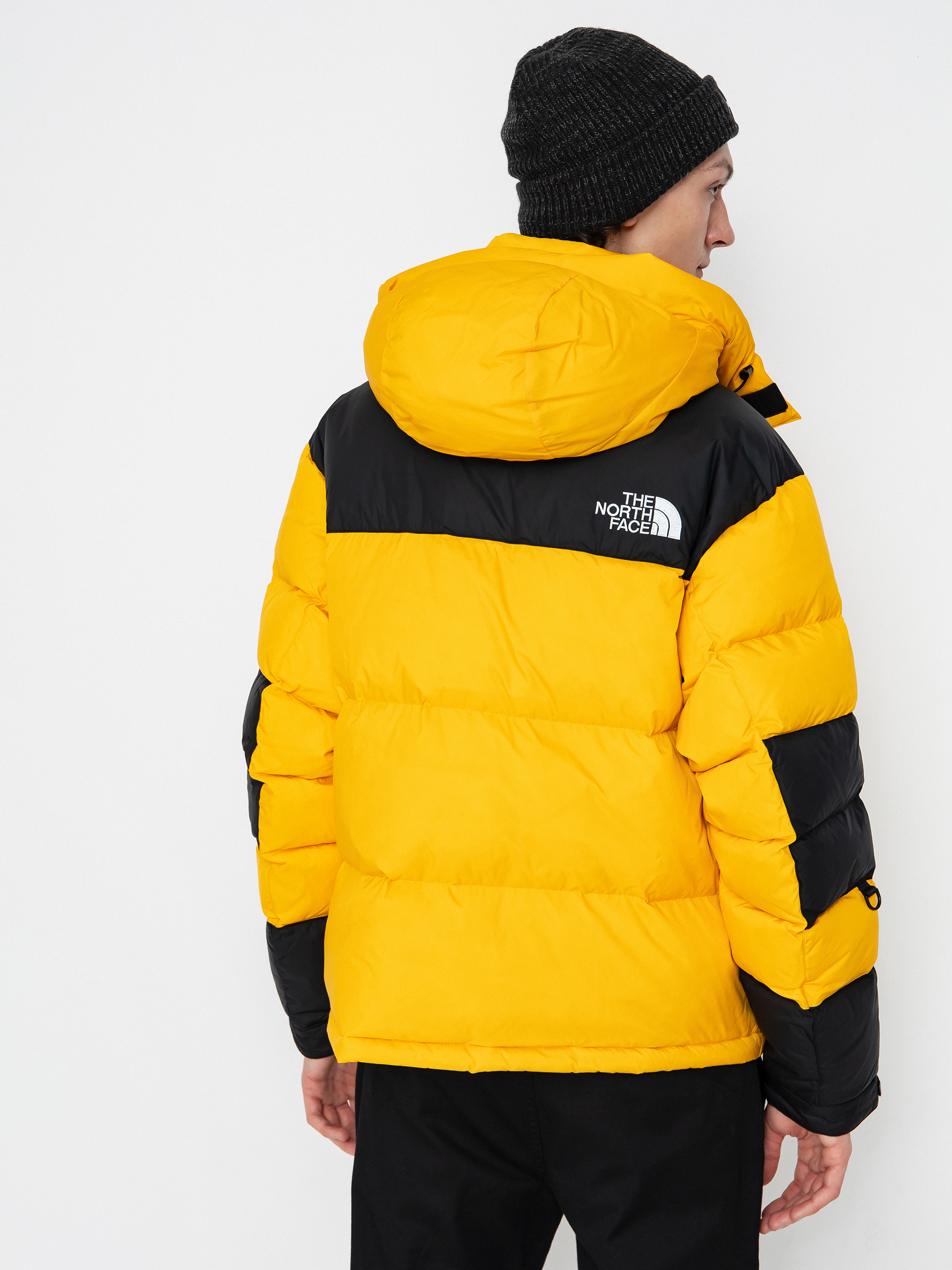 Bunda The North Face Hmlyn Baltoro (summit gold tnf black n)