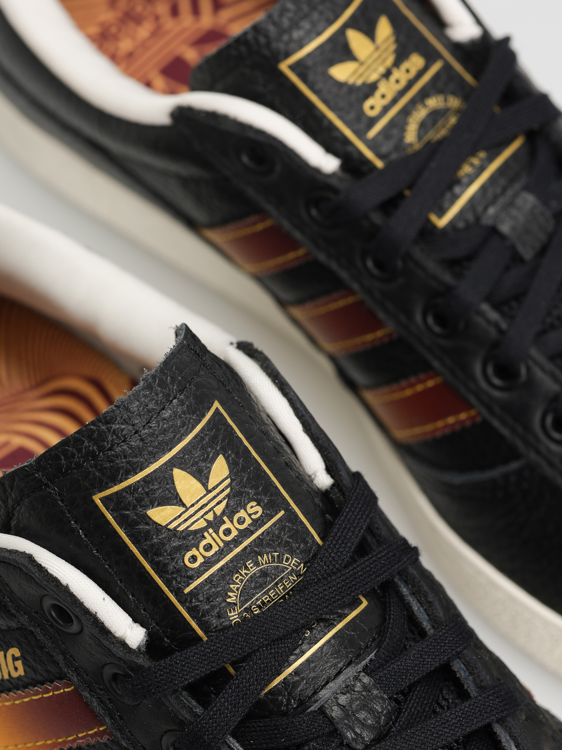 Boty adidas Puig Indoor (cblack/shared/creyel)