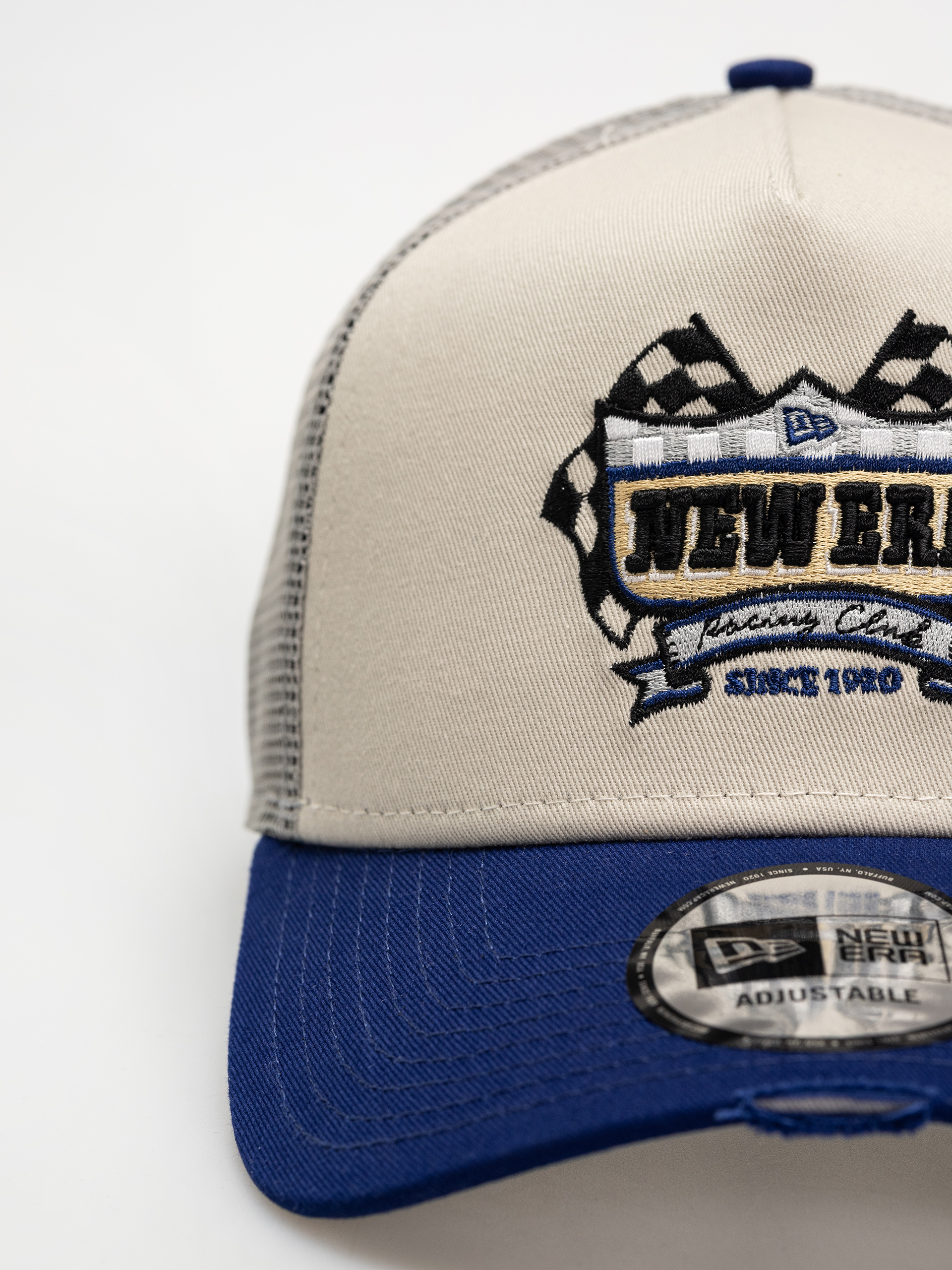 Kšiltovka  New Era Motorsport Trucker (light beige)