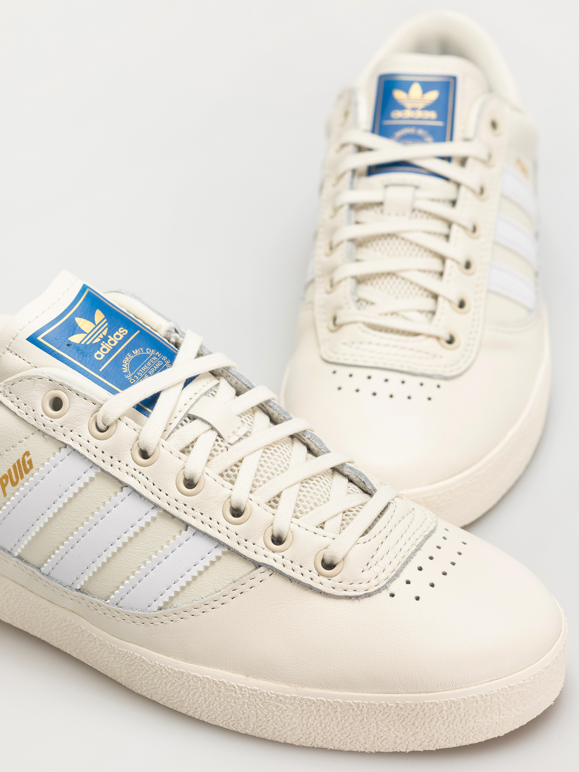 Boty adidas Puig Indoor (owhite/ftwwht/blubir)