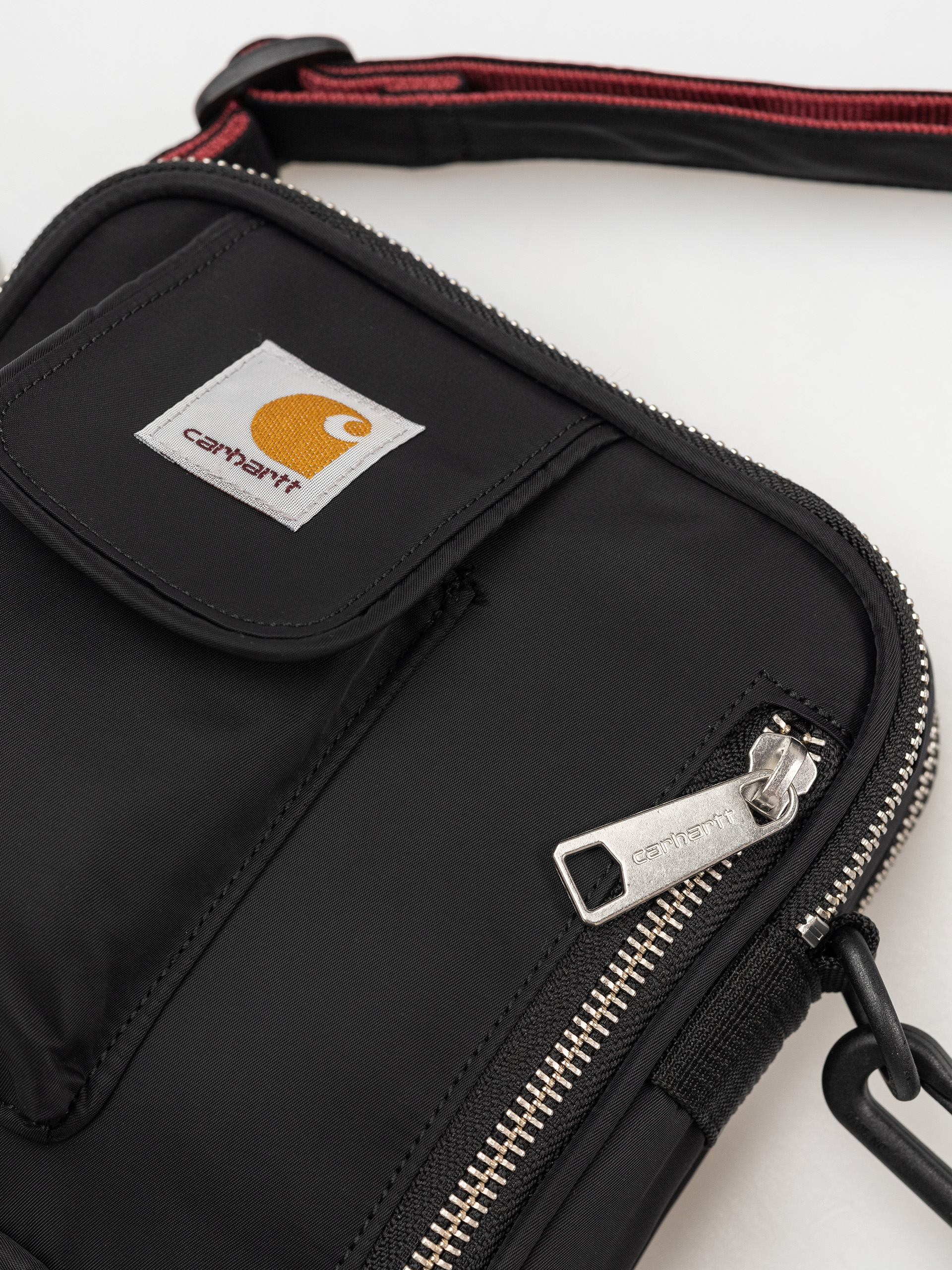 Taška Carhartt WIP Alumni (black/scarlet)