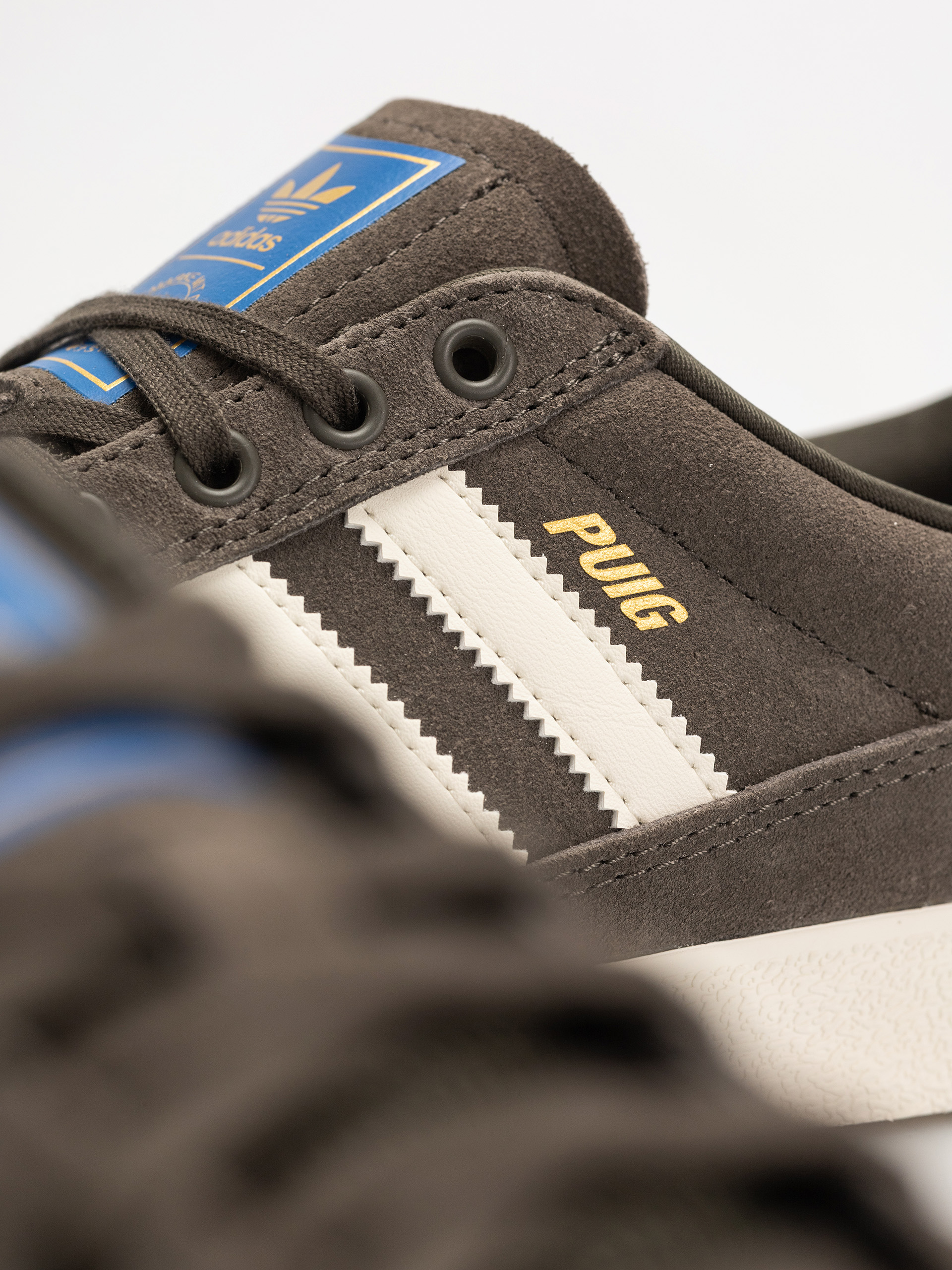 Boty adidas Puig Indoor (shaoli/owhite/blubir)