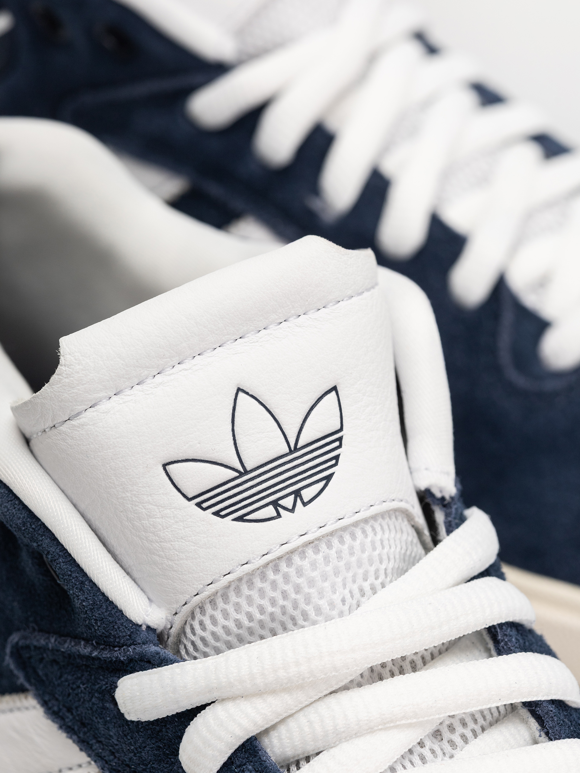 Boty adidas Tyshawn (conavy/ftwwht/cwhite)