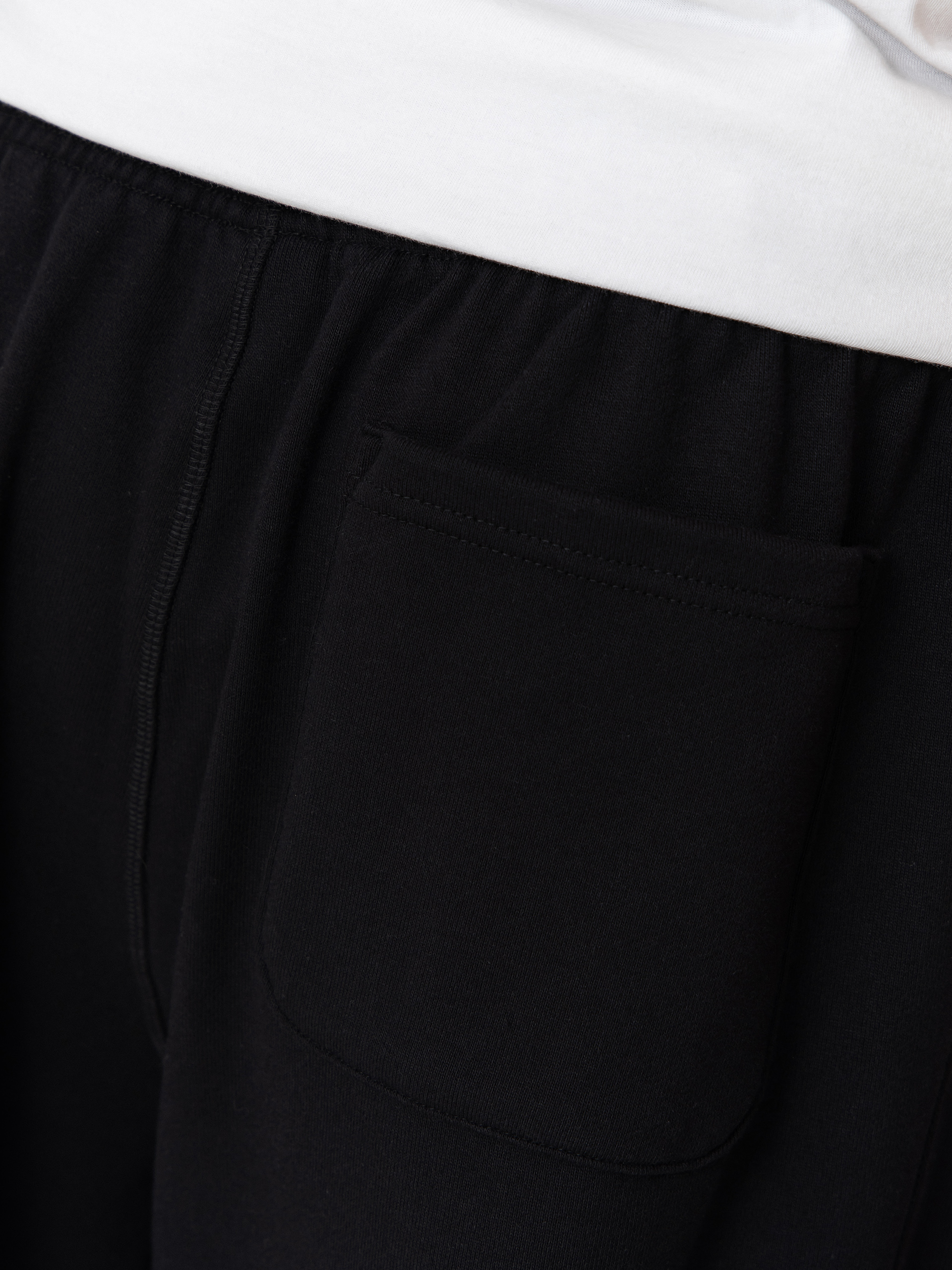 Kalhoty New Balance Athletics French Terry (black)