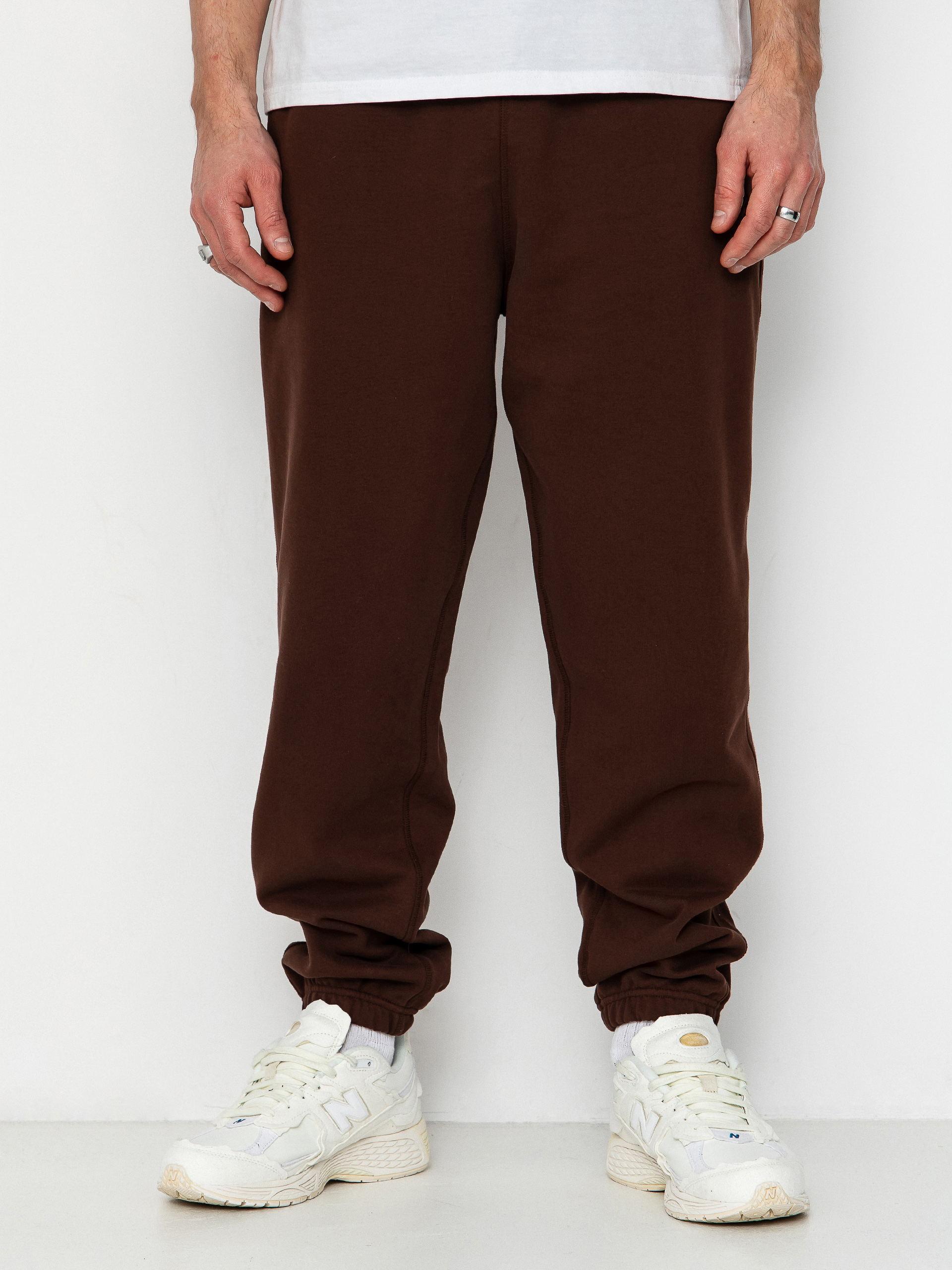 Kalhoty New Balance Athletics French Terry Jogger (pumpernickel)
