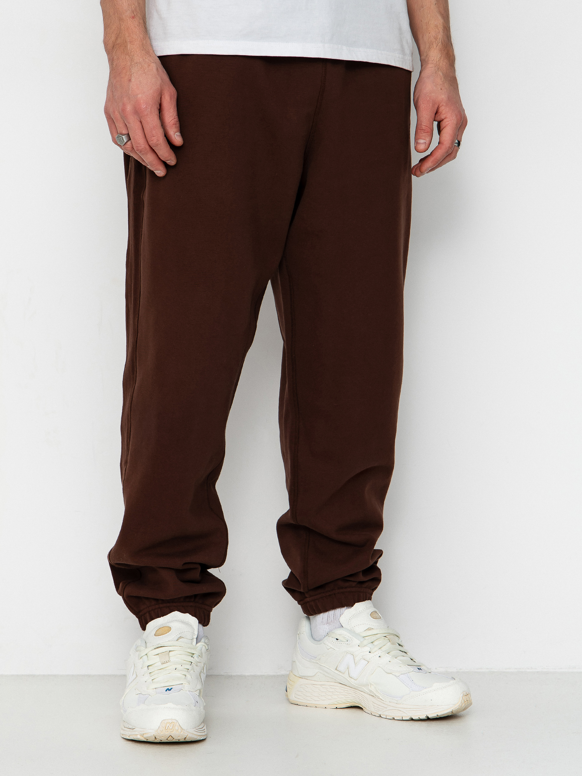 Kalhoty New Balance Athletics French Terry Jogger (pumpernickel)