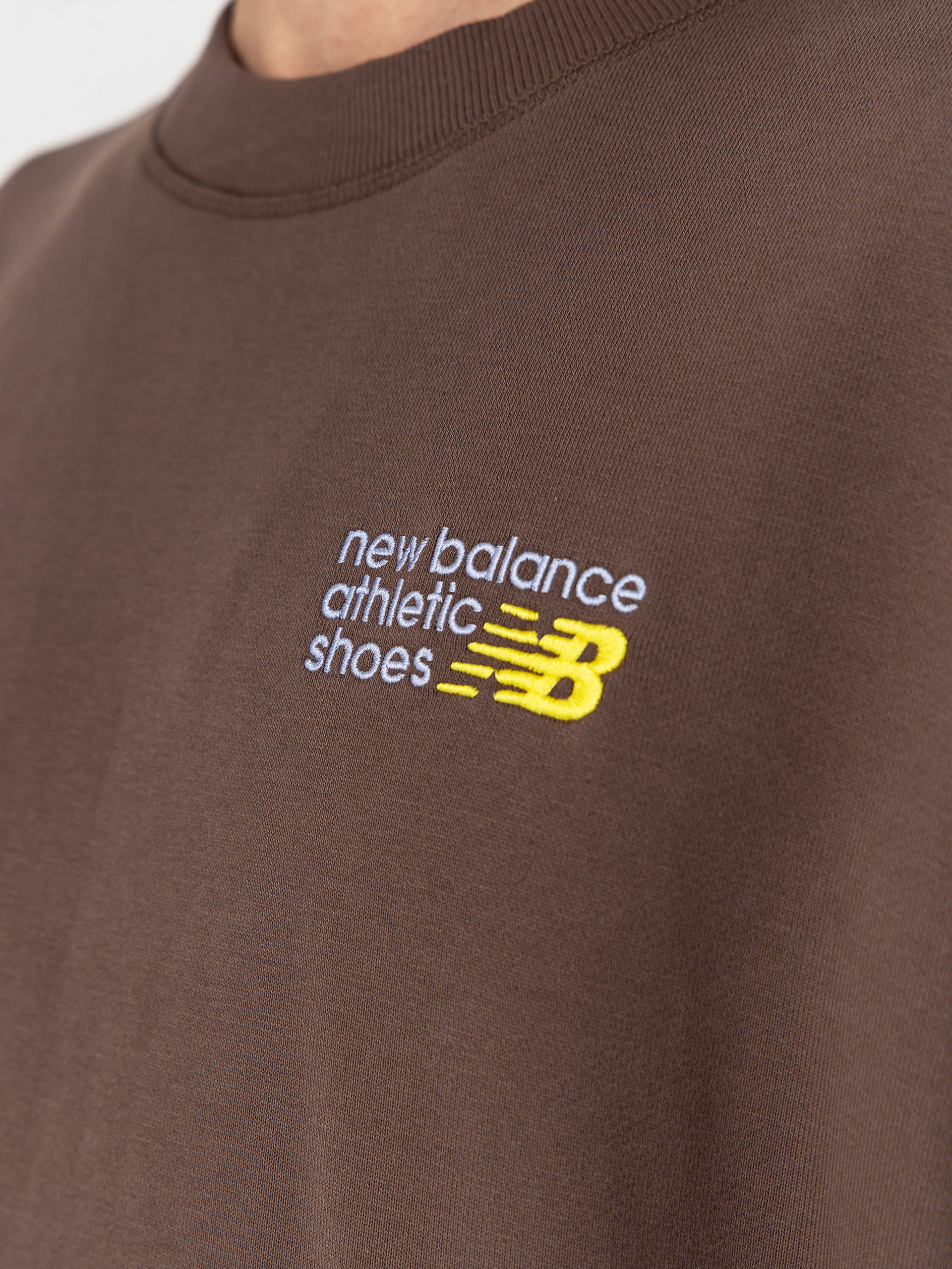 Mikina New Balance Athletics Premium Logo Crew (cortado)