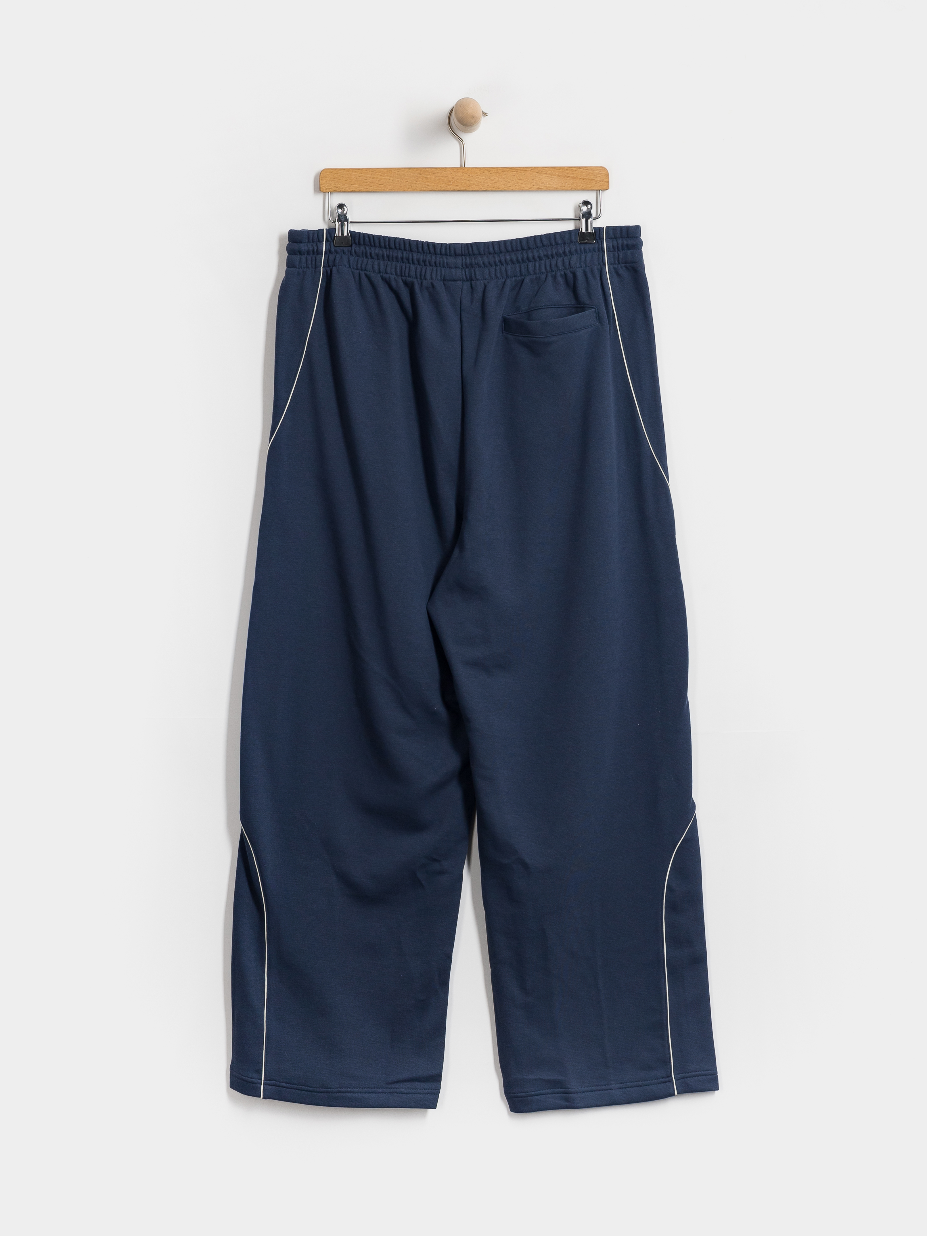 Kalhoty New Balance Trackside French Terry (navy)