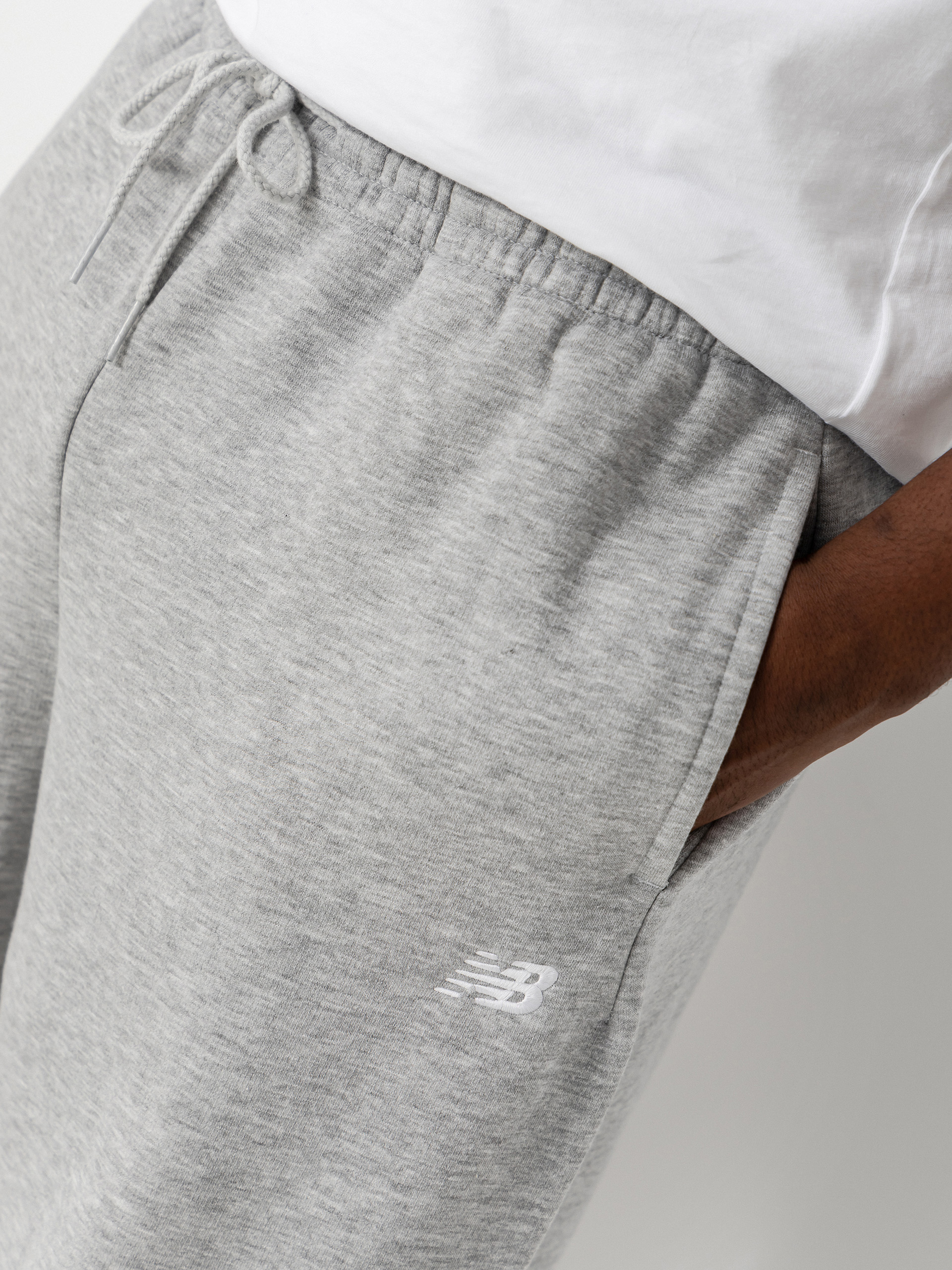 Kalhoty New Balance Sport Essentials Fleece (athletic grey)