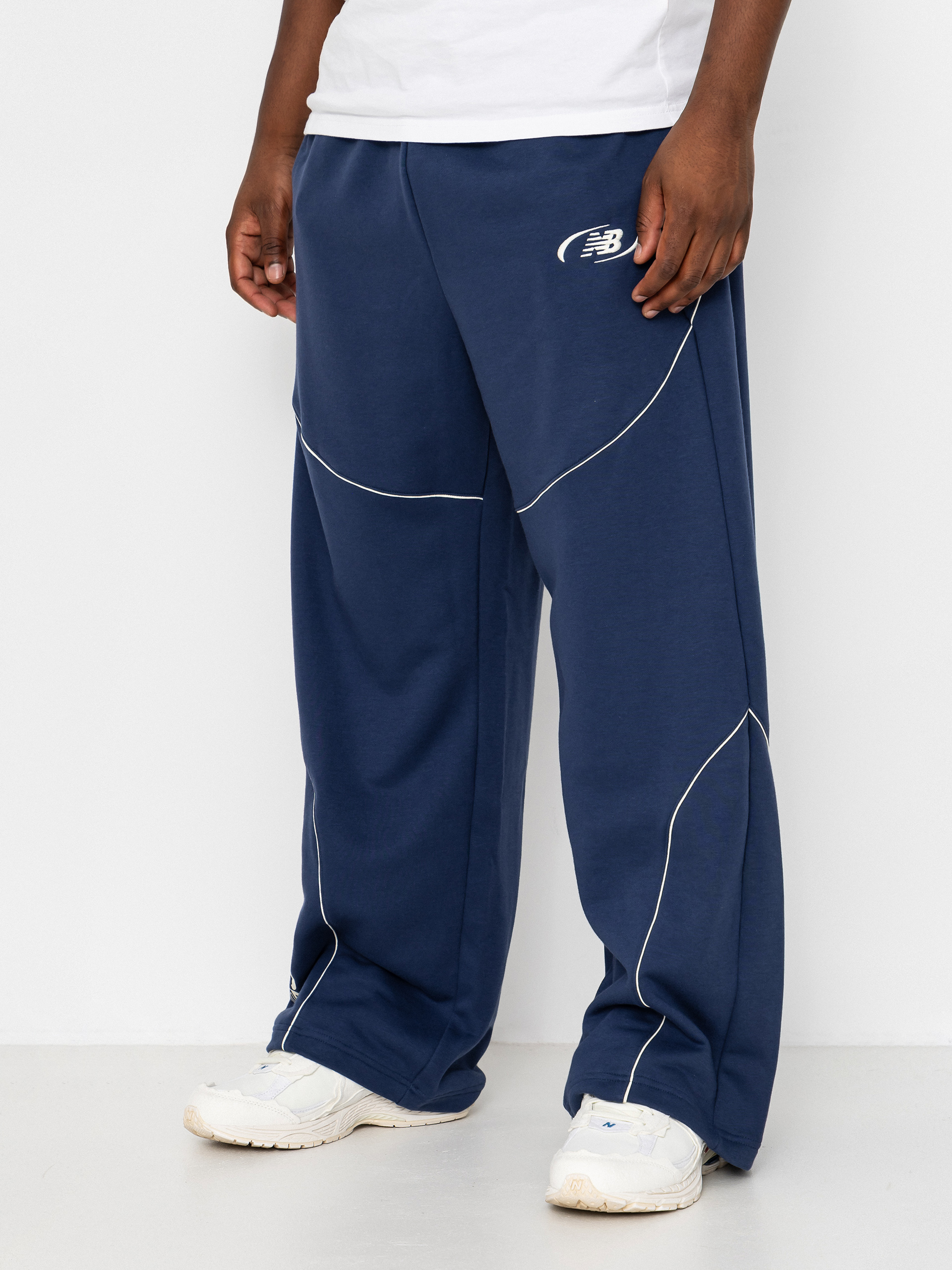 Kalhoty New Balance Trackside French Terry (navy)