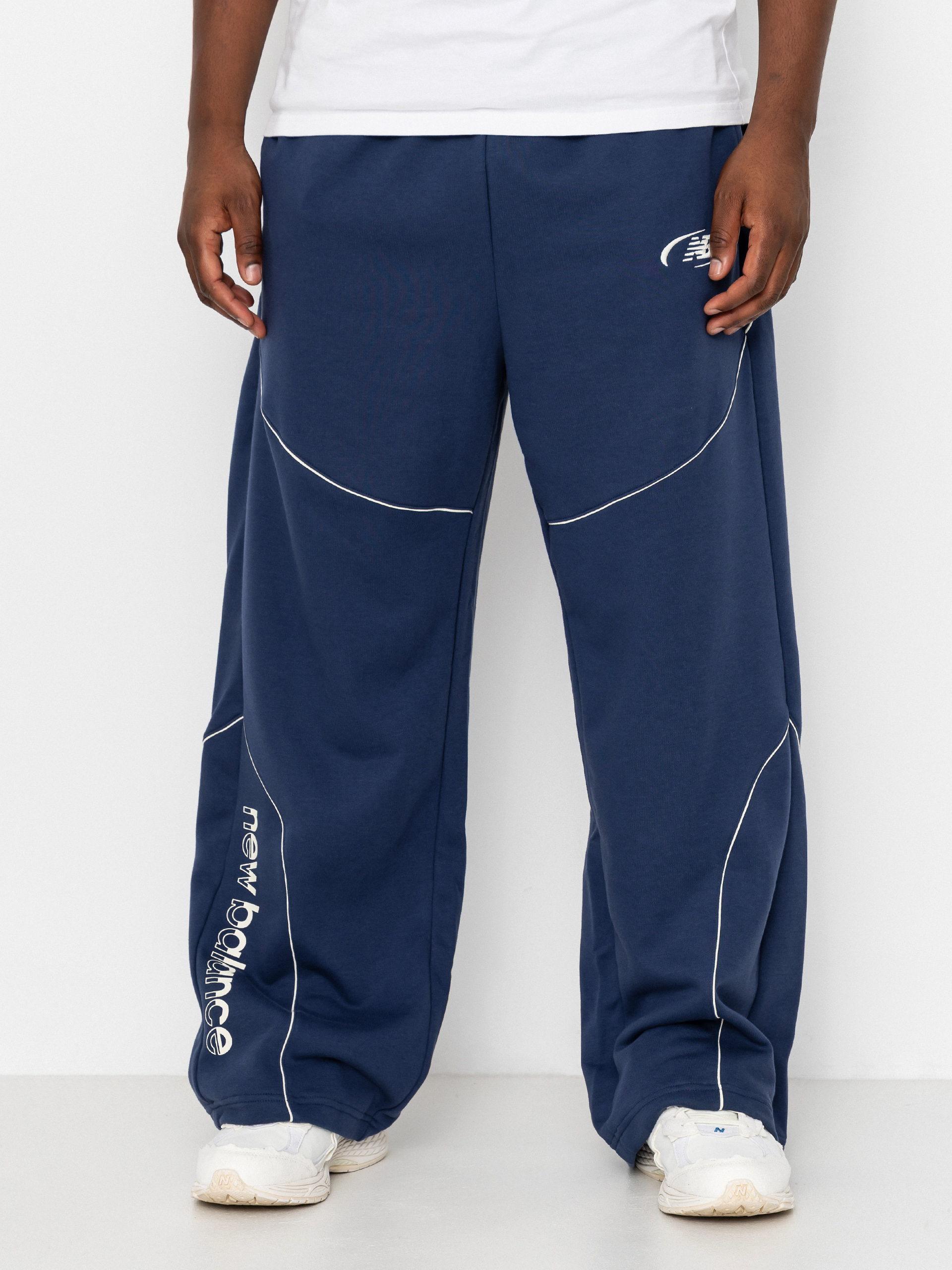 Kalhoty New Balance Trackside French Terry (navy)