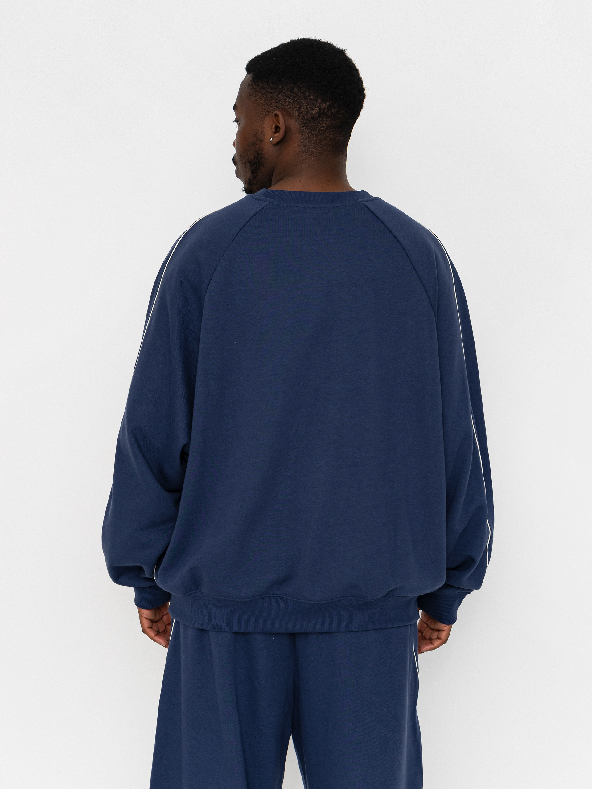 Mikina New Balance Trackside French Terry (navy)