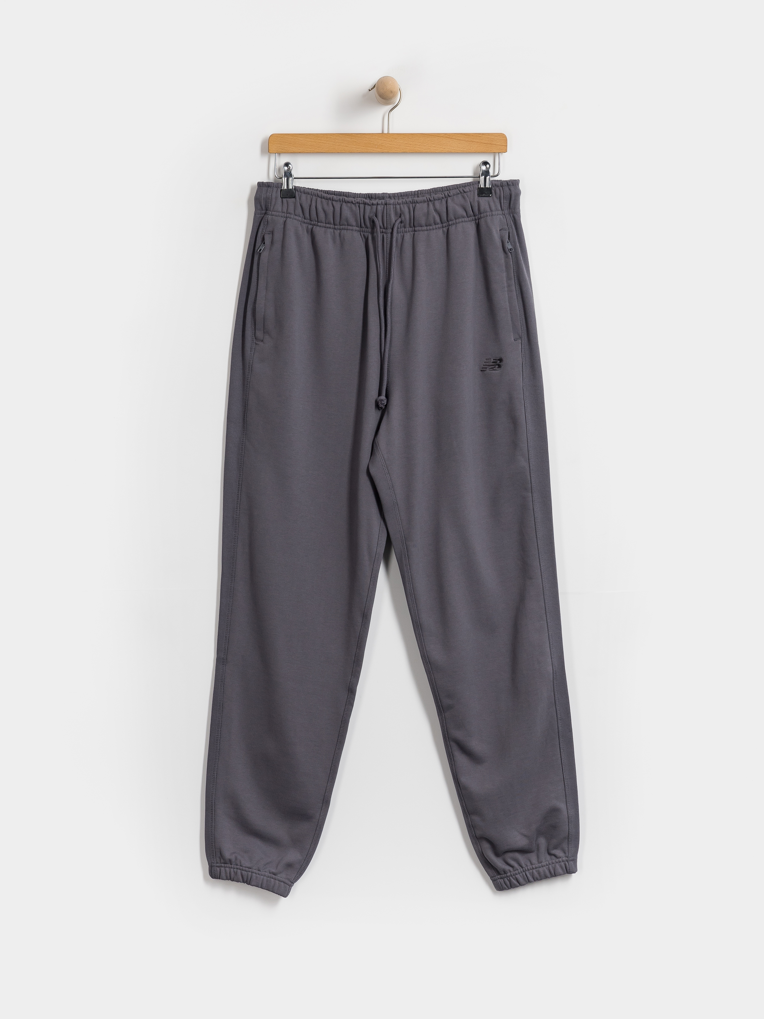 Kalhoty New Balance Athletics French Terry Jogger (neptune grey)
