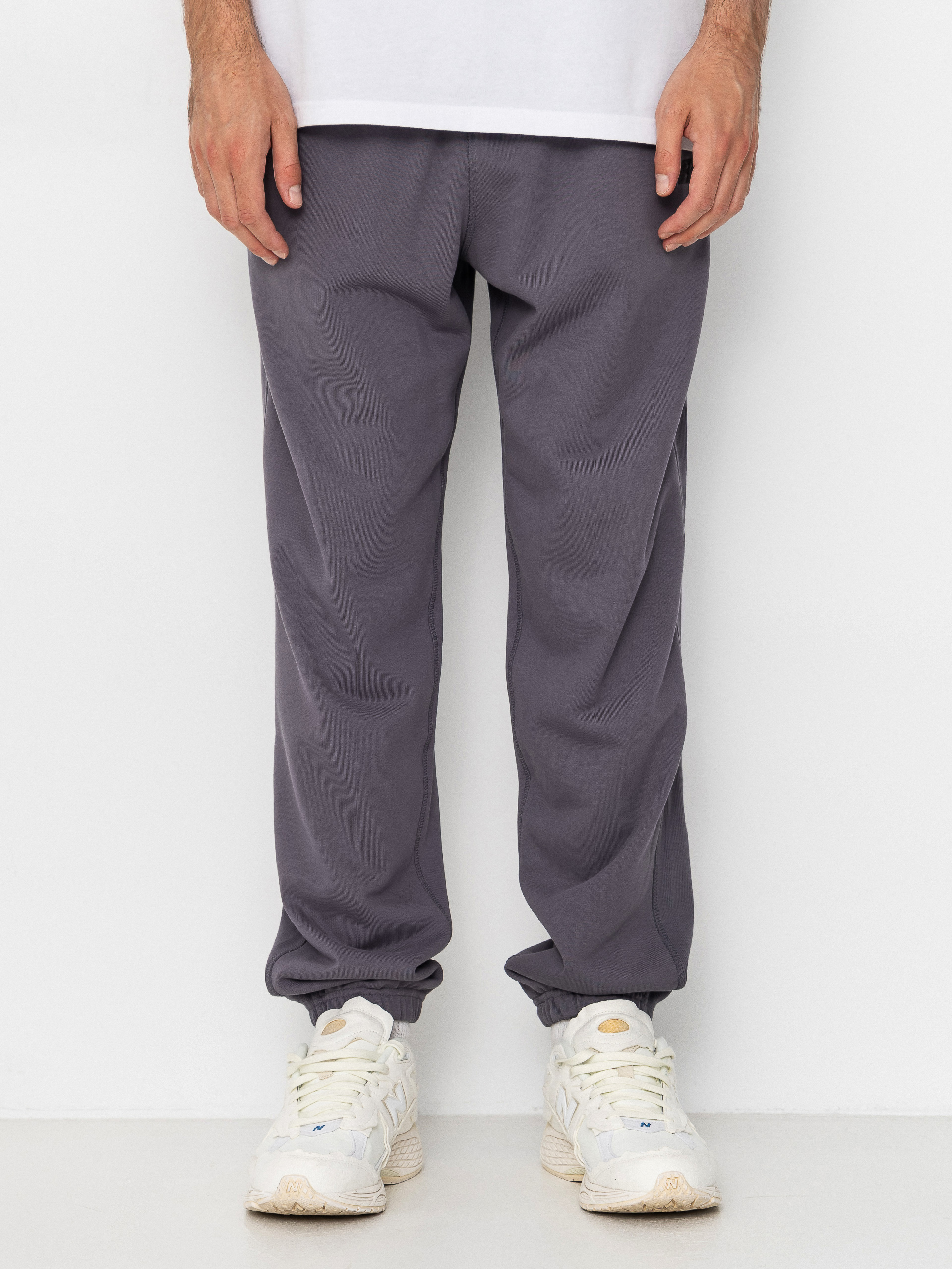 Kalhoty New Balance Athletics French Terry Jogger (neptune grey)
