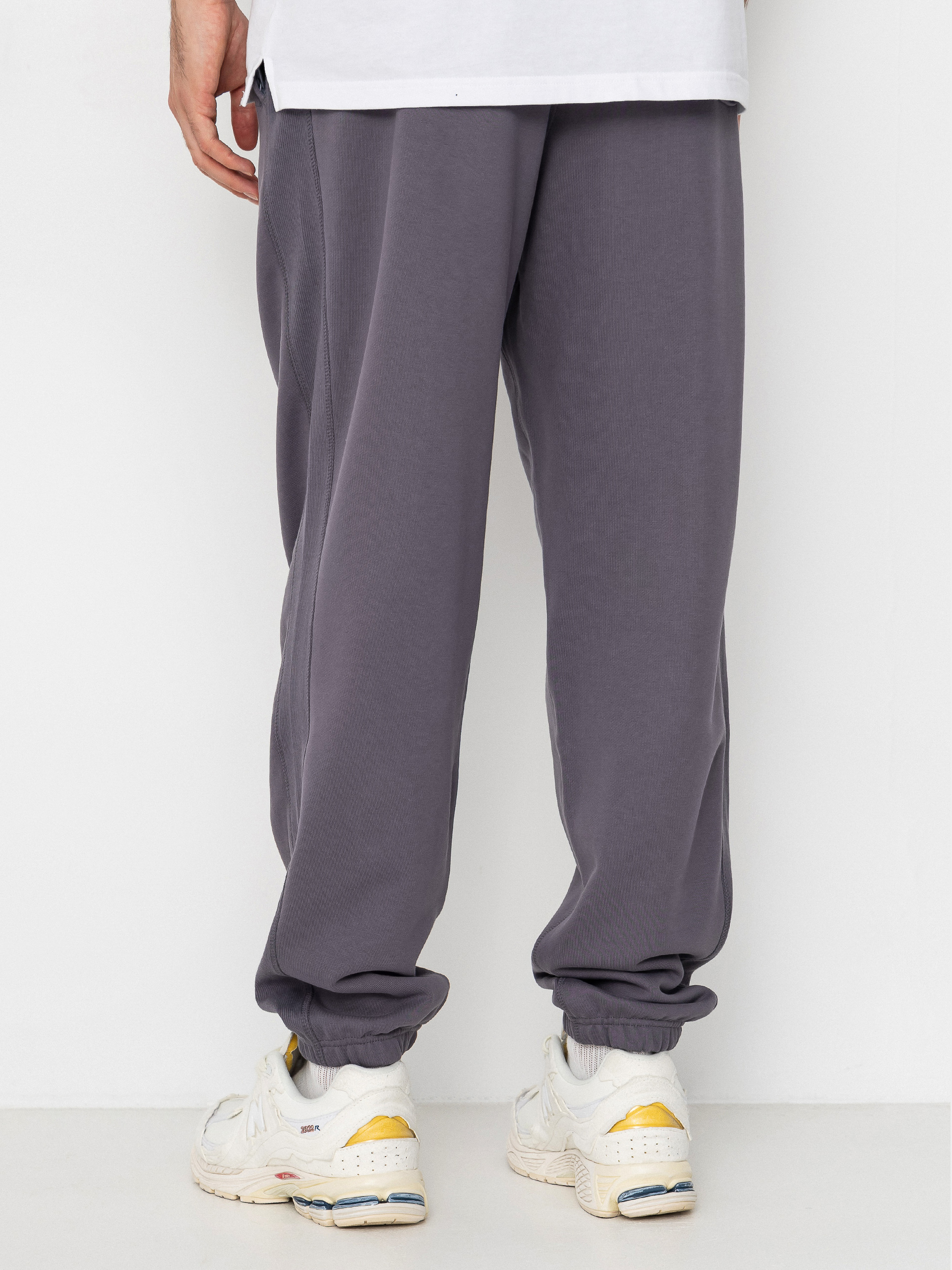 Kalhoty New Balance Athletics French Terry Jogger (neptune grey)
