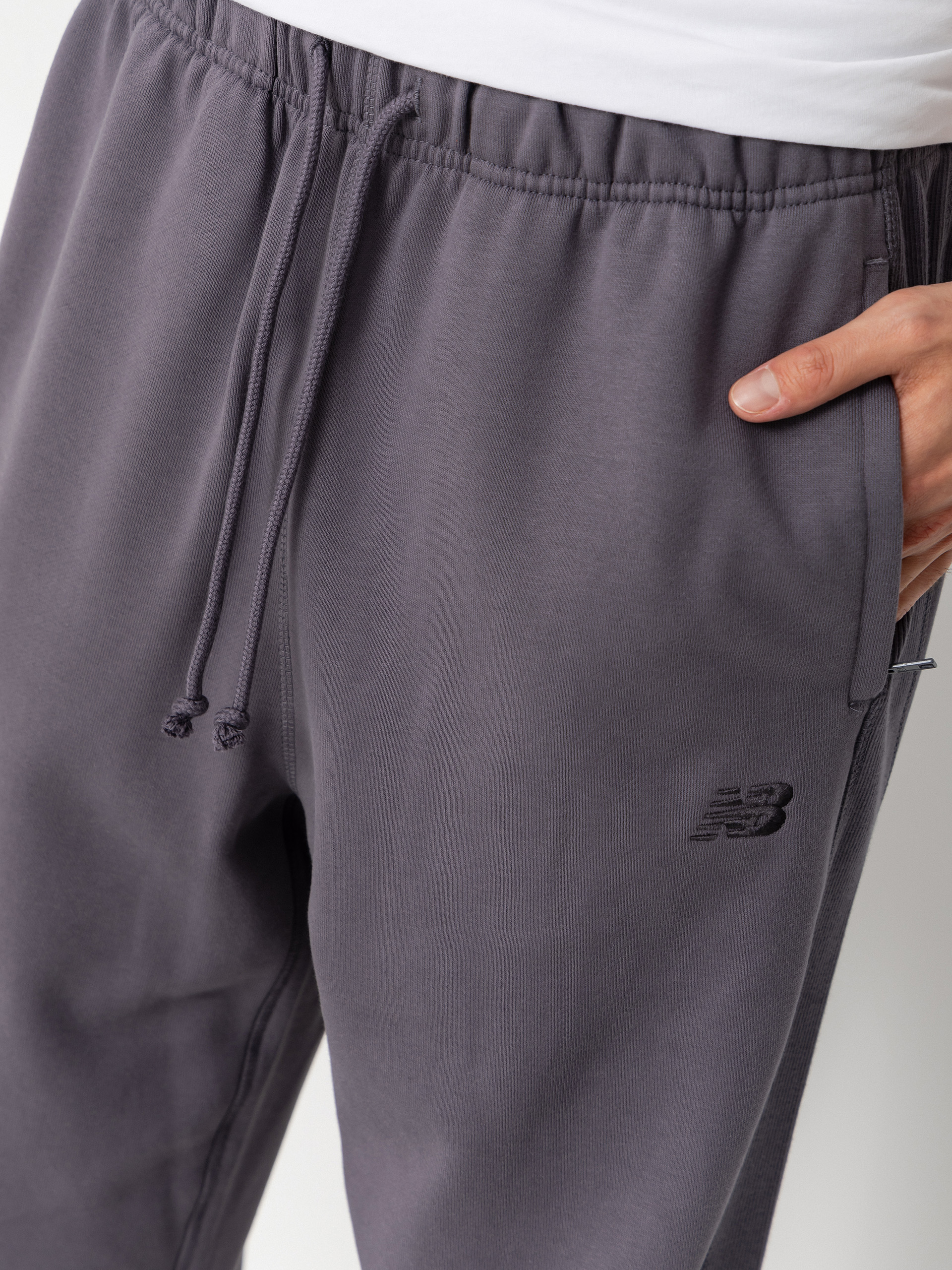 Kalhoty New Balance Athletics French Terry Jogger (neptune grey)