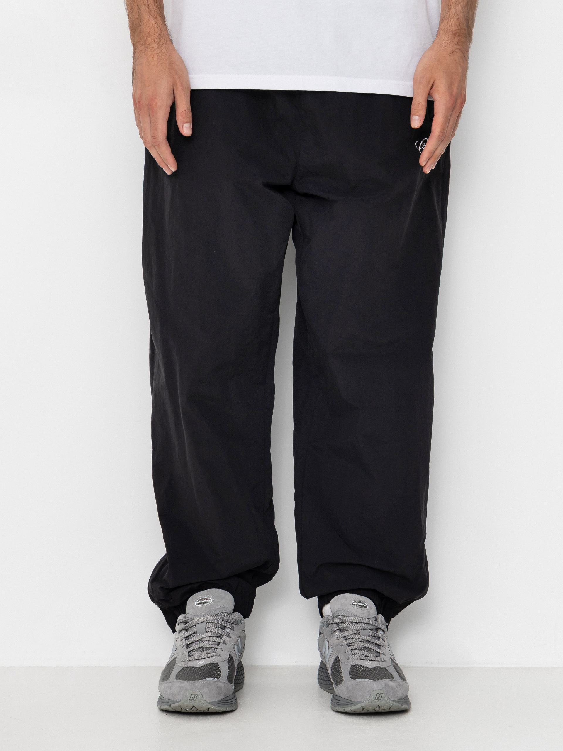 Kalhoty Carhartt WIP Travon (black/wax)
