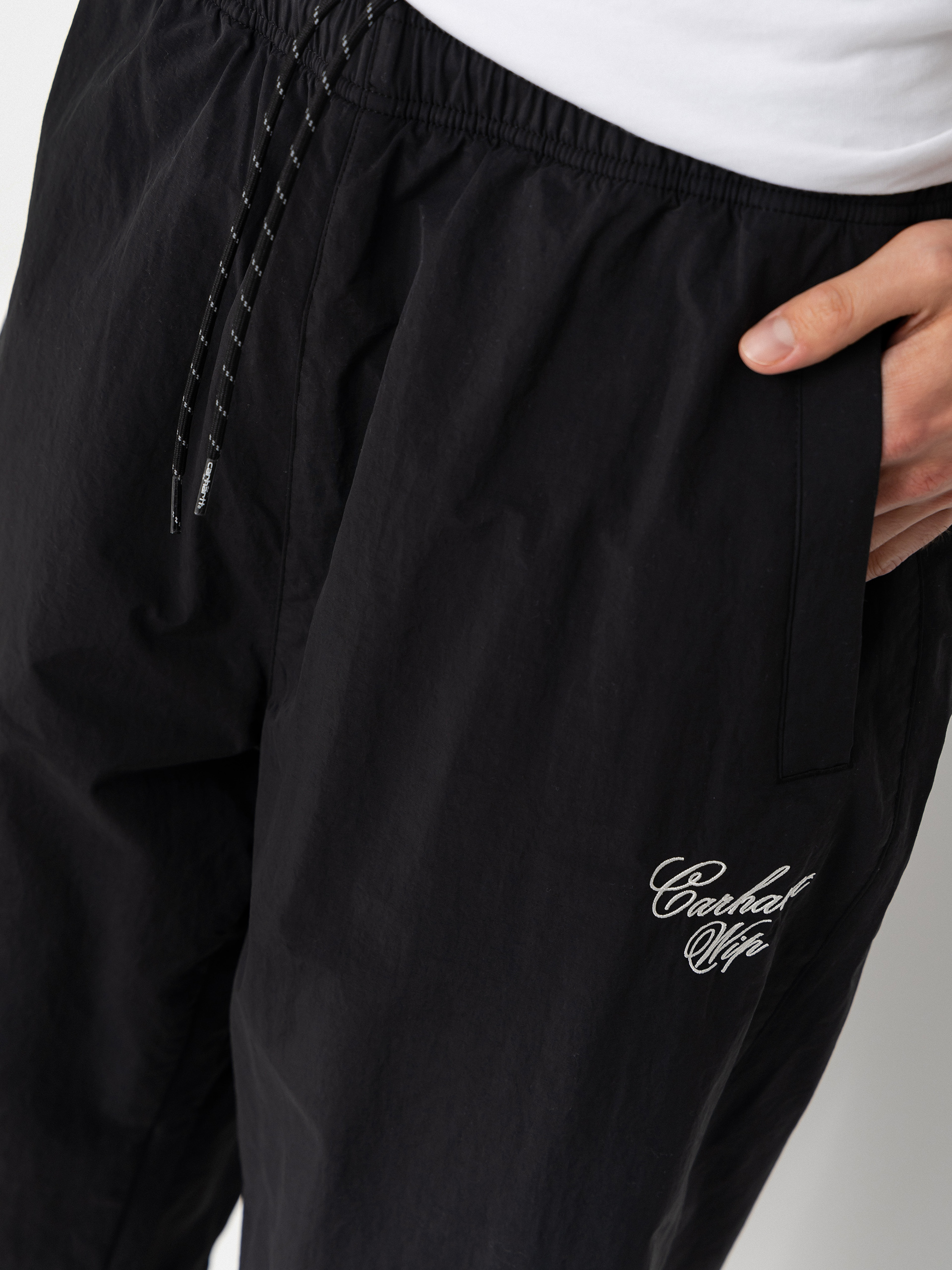 Kalhoty Carhartt WIP Travon (black/wax)