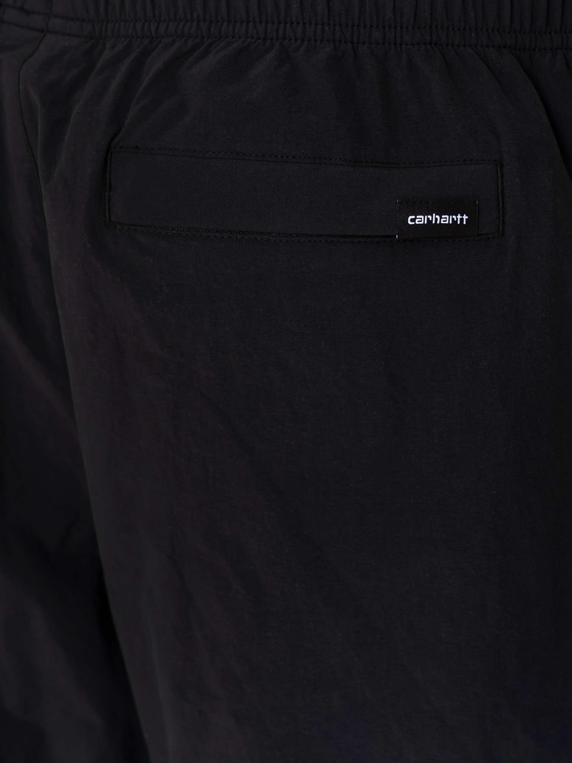Kalhoty Carhartt WIP Travon (black/wax)
