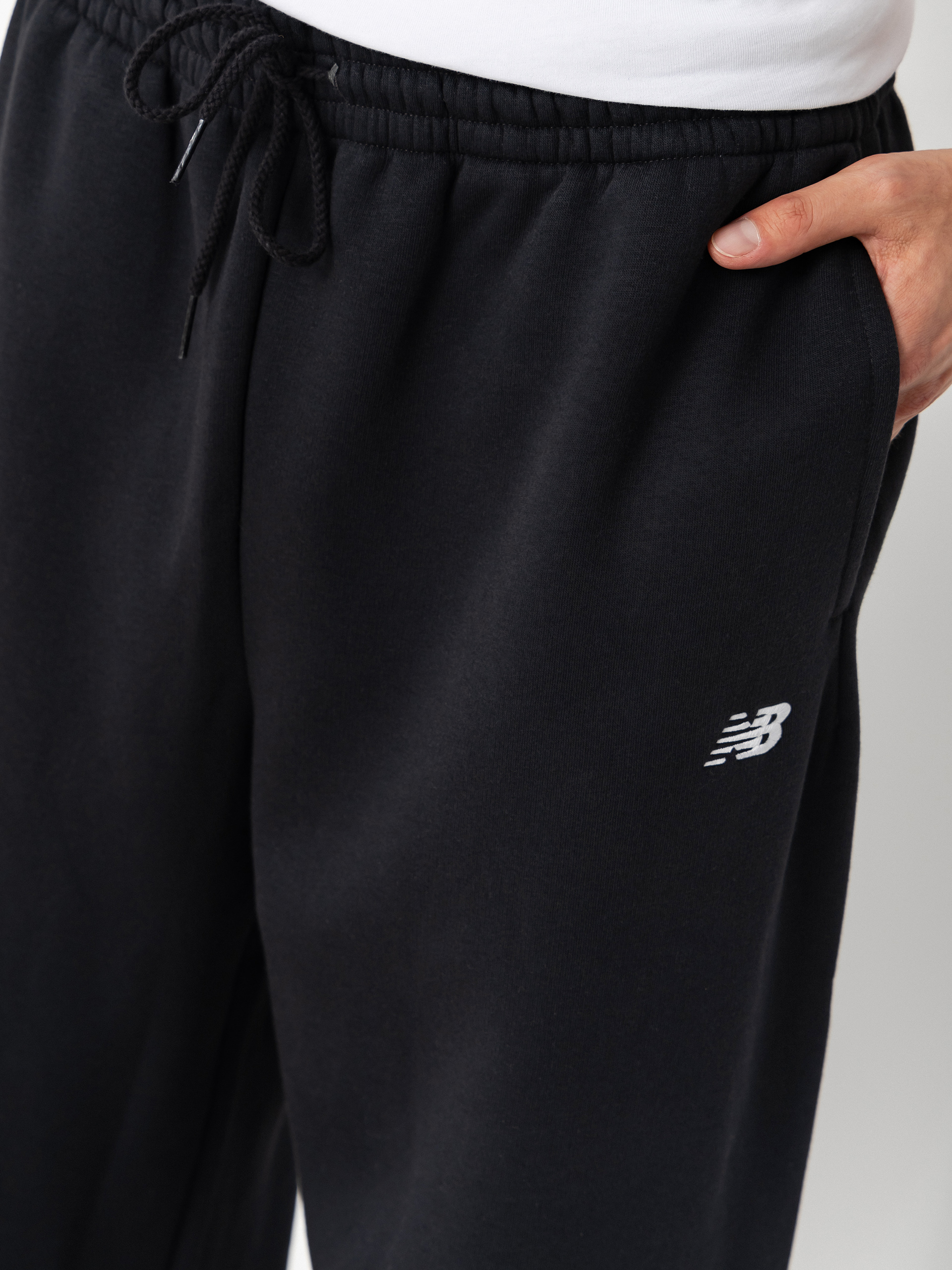 Kalhoty New Balance Sport Essentials Fleece (black)