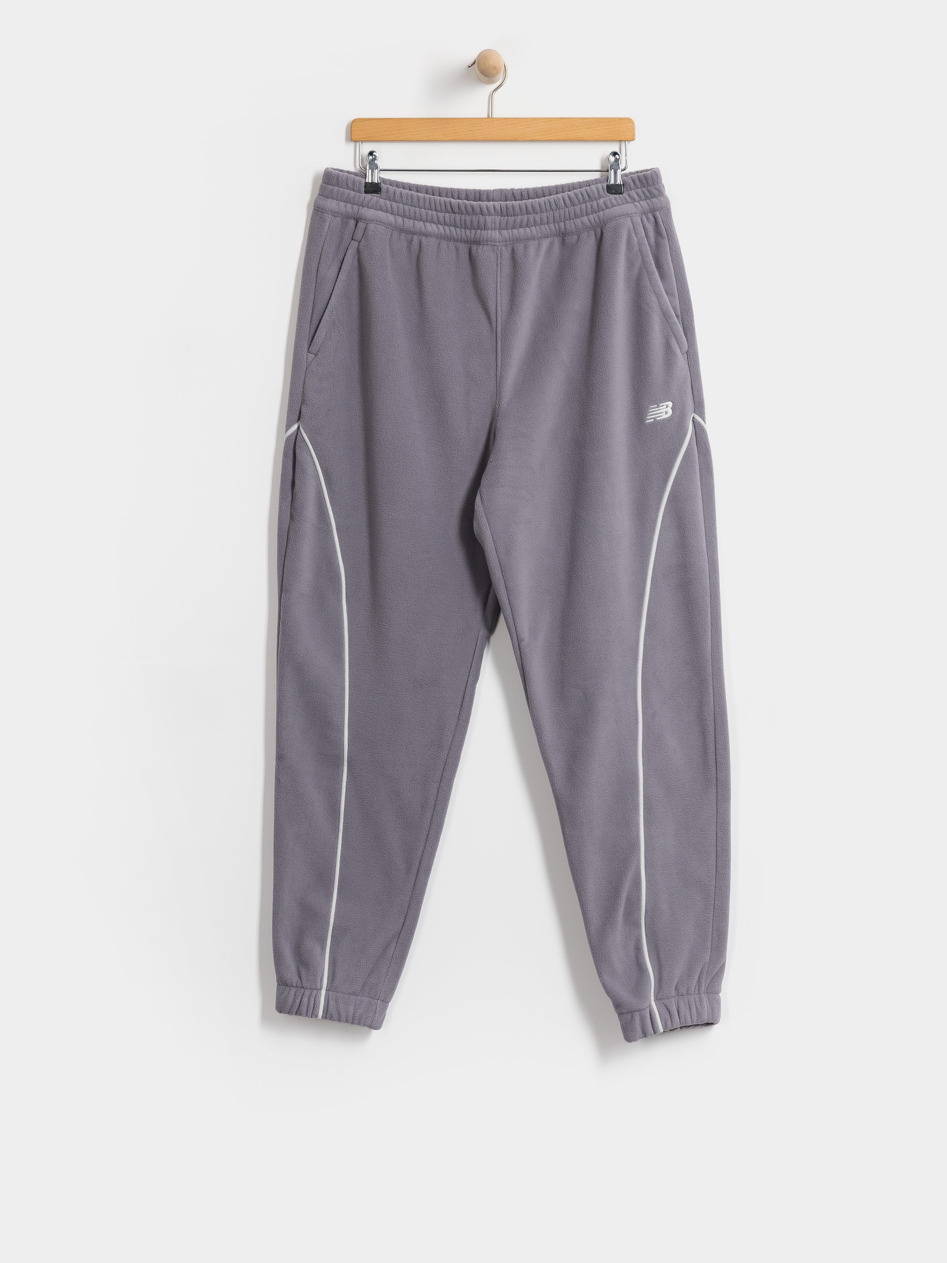 Kalhoty New Balance Trackside Polar Fleece Jogger (off line grey)