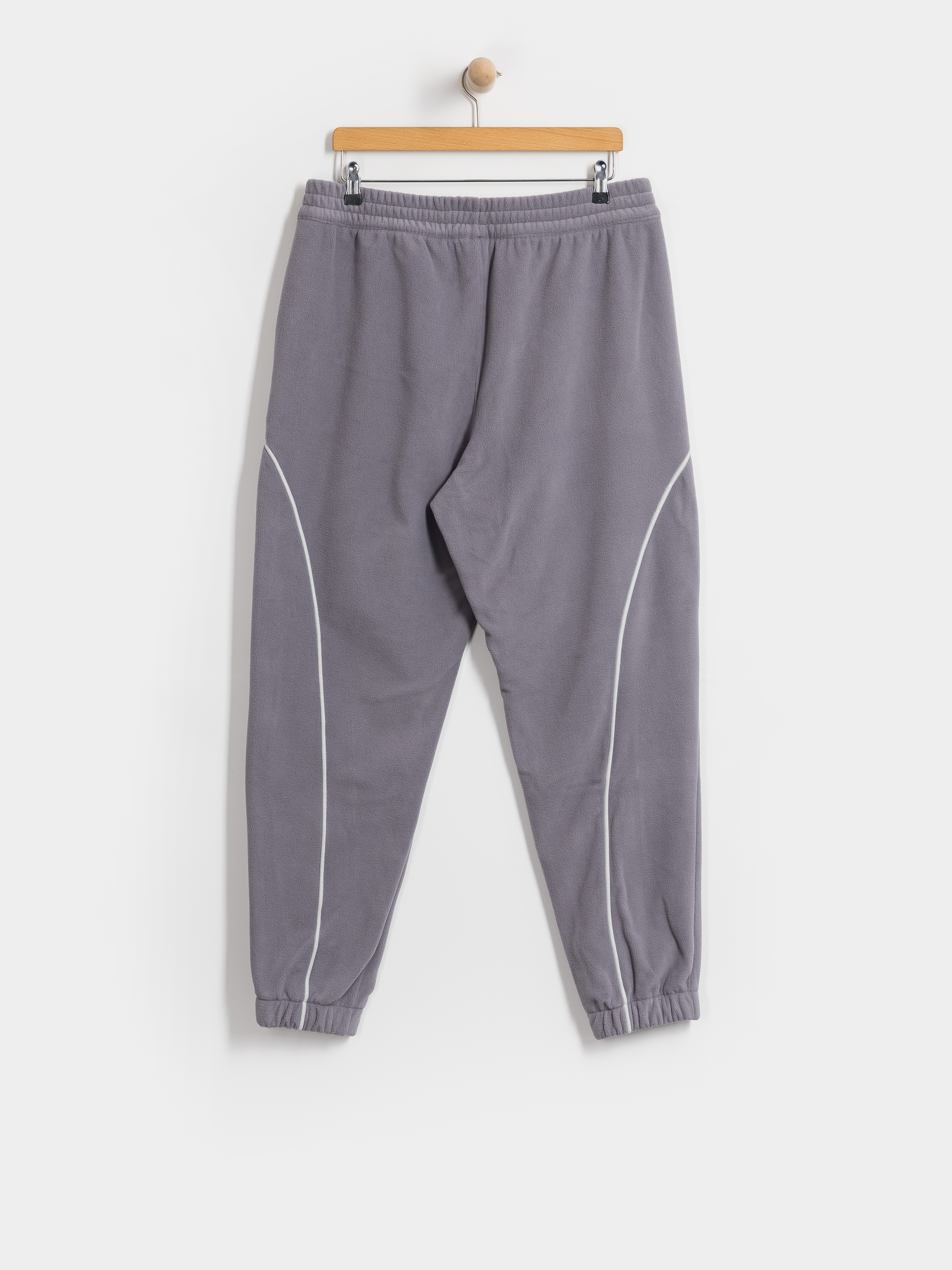 Kalhoty New Balance Trackside Polar Fleece Jogger (off line grey)