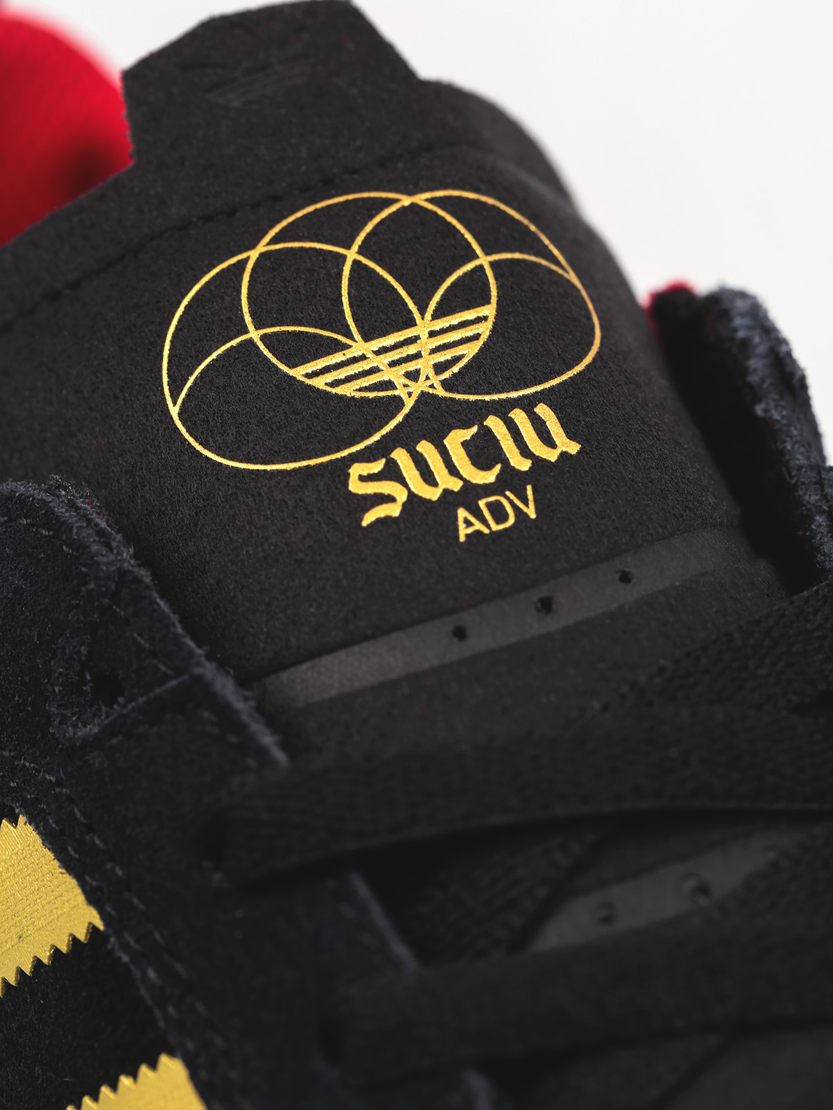 Boty adidas Suciu Adv (cblack/goldf/gum4)